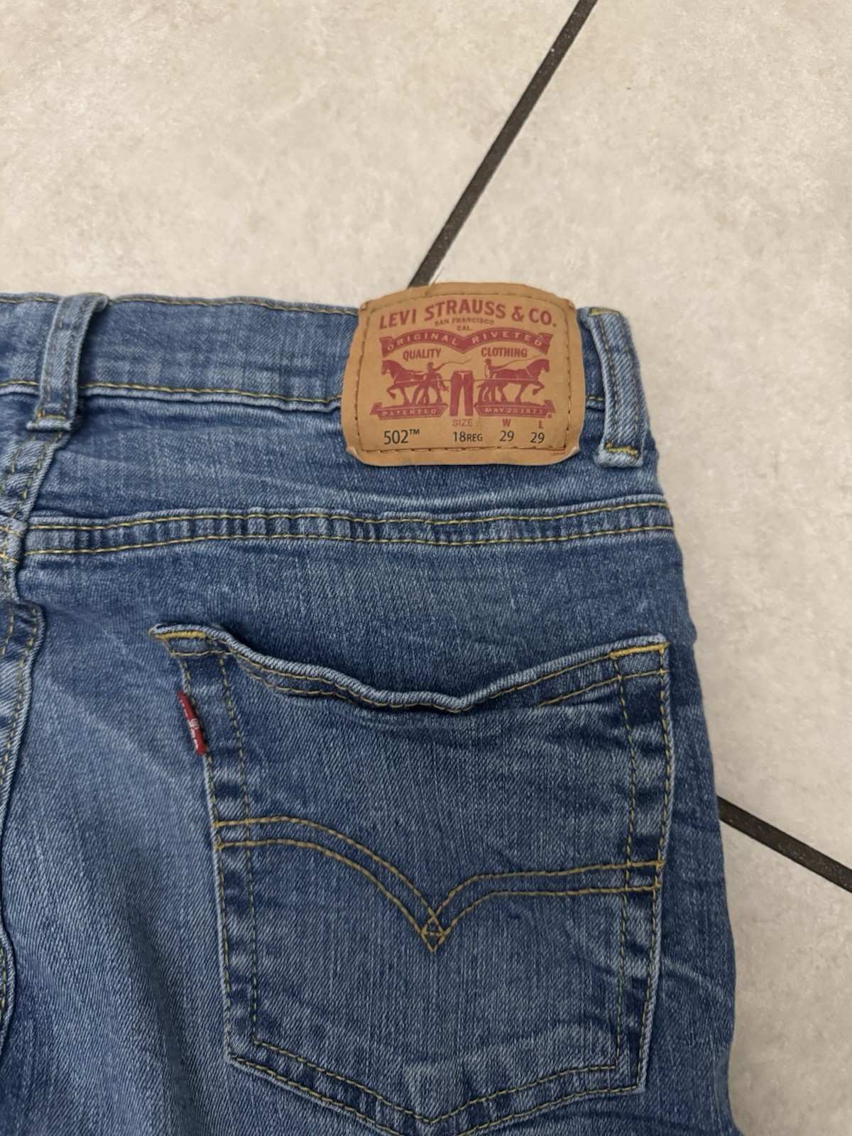 Distressed Levi’s Men’s Regular Taper Blue Denim Jeans Medium Wash
