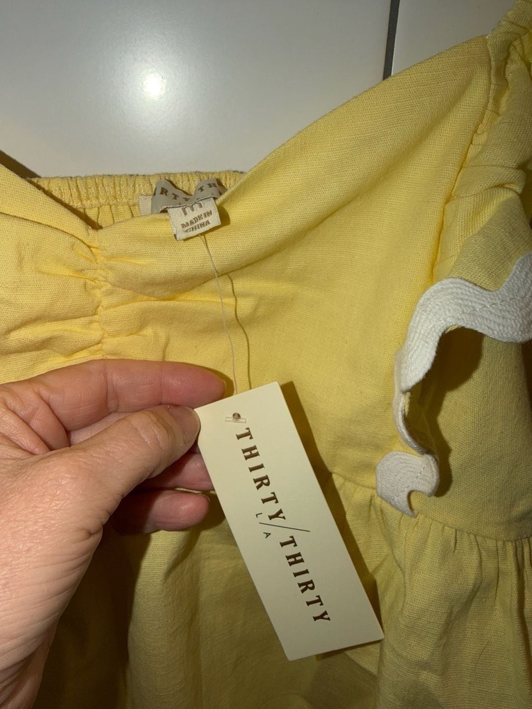 THIRTY/THIRTY L.A. Yellow Ruffle Sleeve Smocked Peplum Top