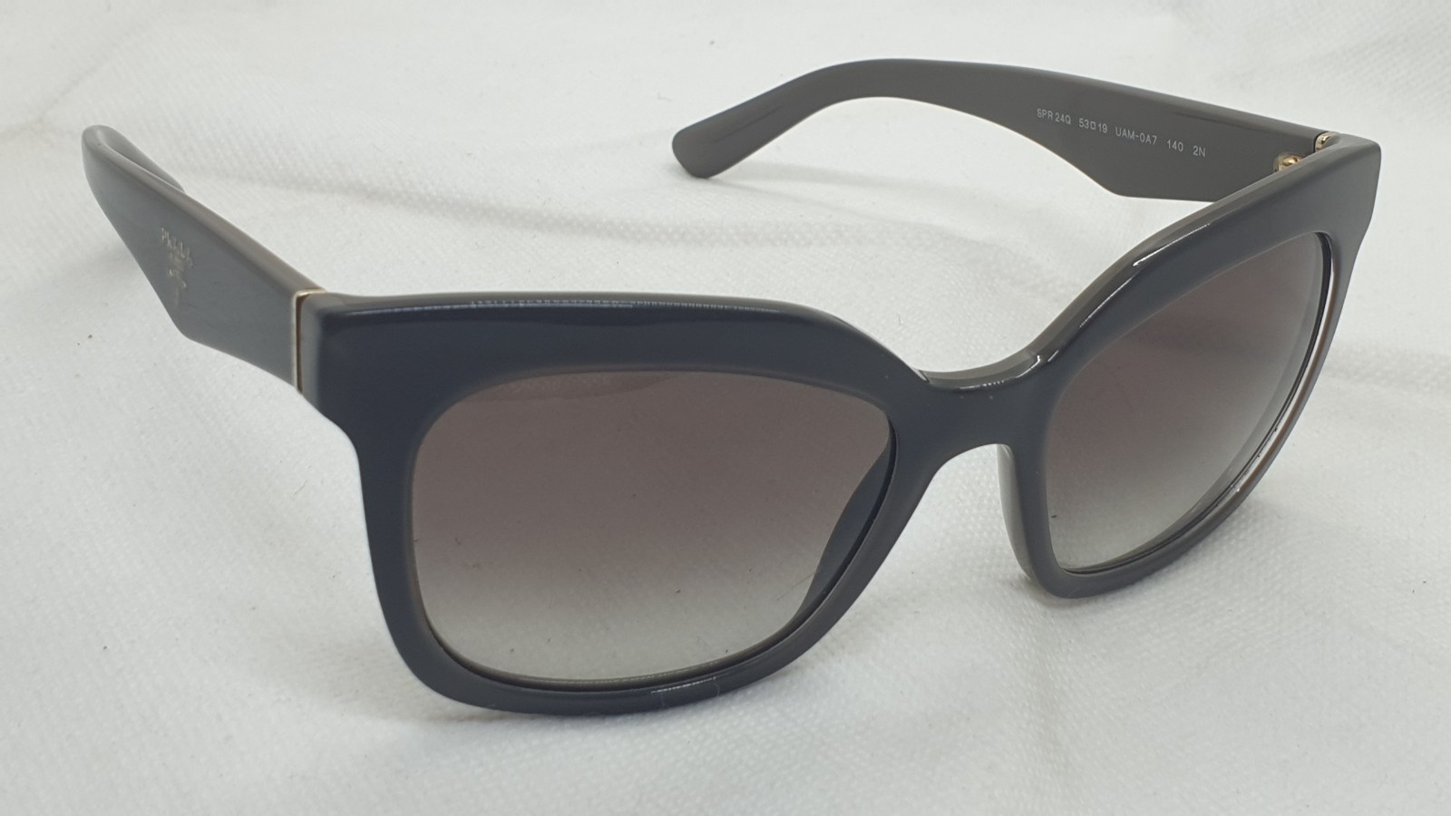 Prada SPR 24Q UAM-0A7 Sunglasses. Made in italy