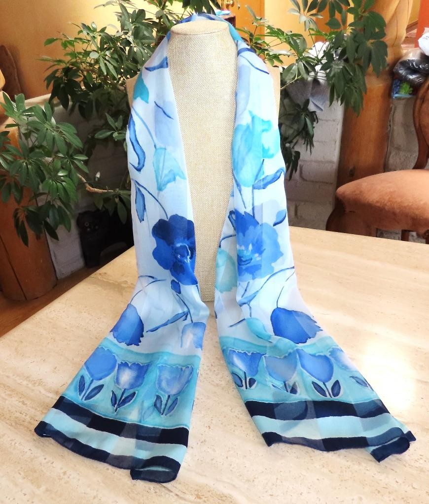 Oblong floral scarf; blue tones, white; 60×14.5 in. Semisheer; poly blend?