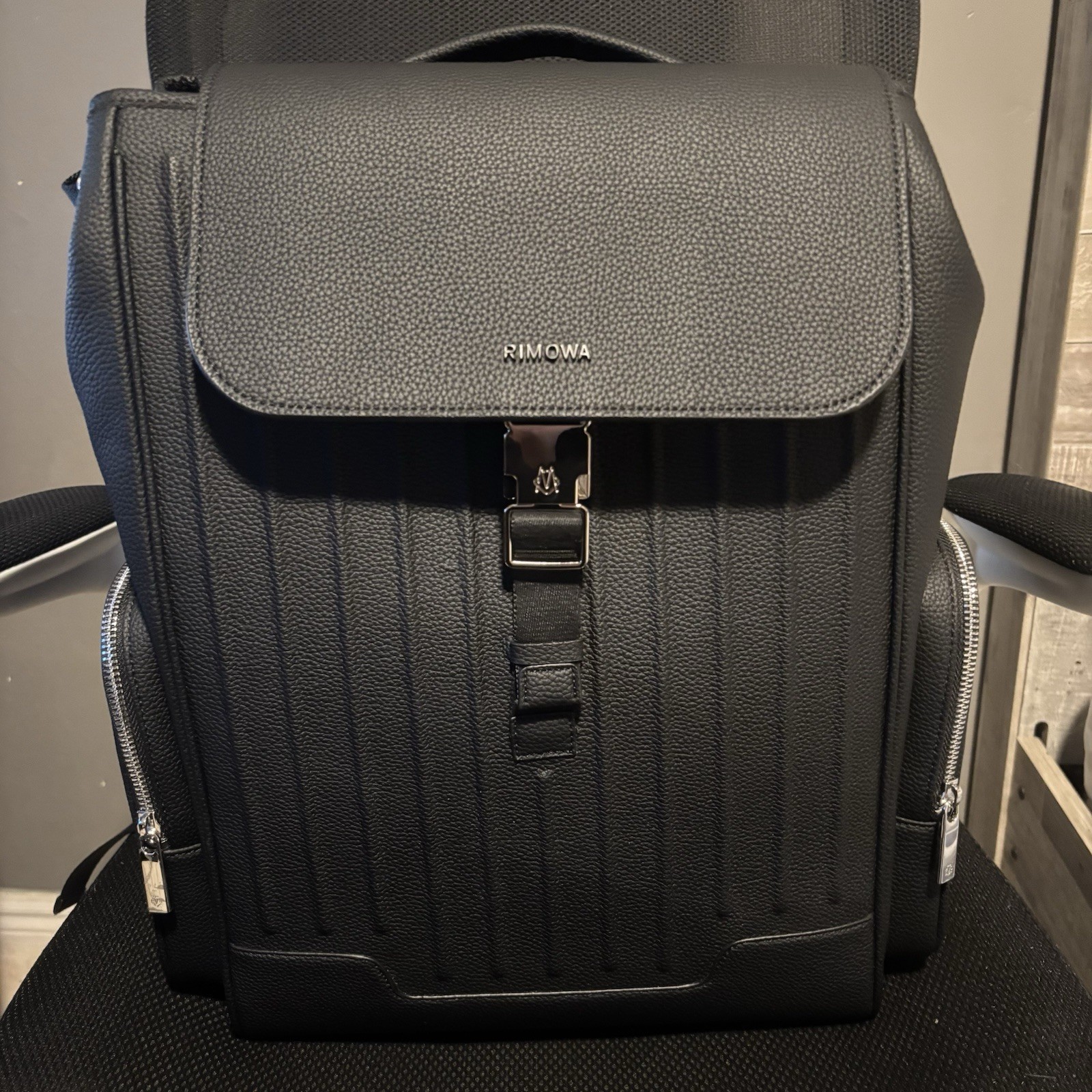 RIMOWA Black Backpack Buckle Flap Zip Closure Outer Side Pockets Double Handles