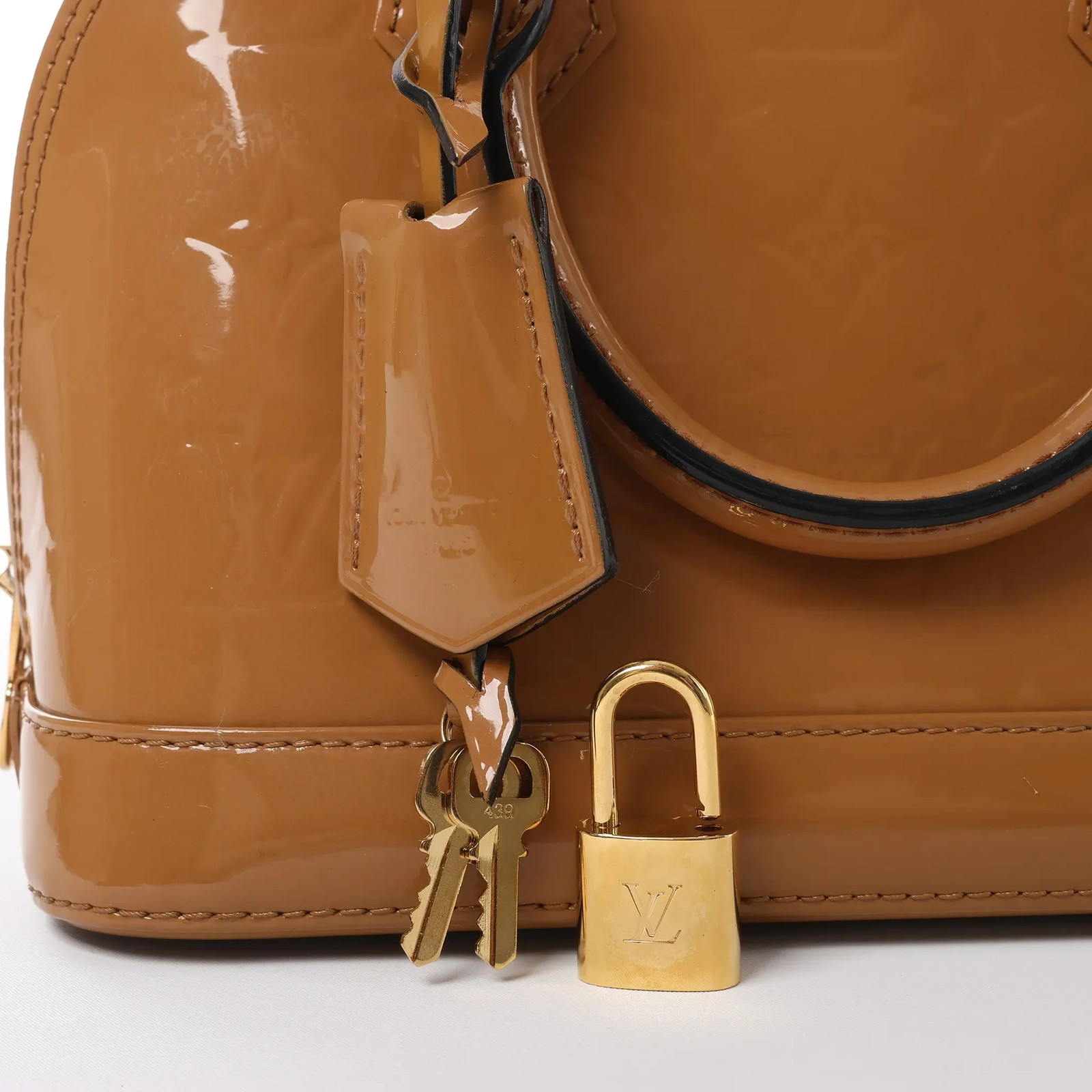 Louis Vuitton Alma BB Monogram Vernis 2Way Handbag in Brown M91585