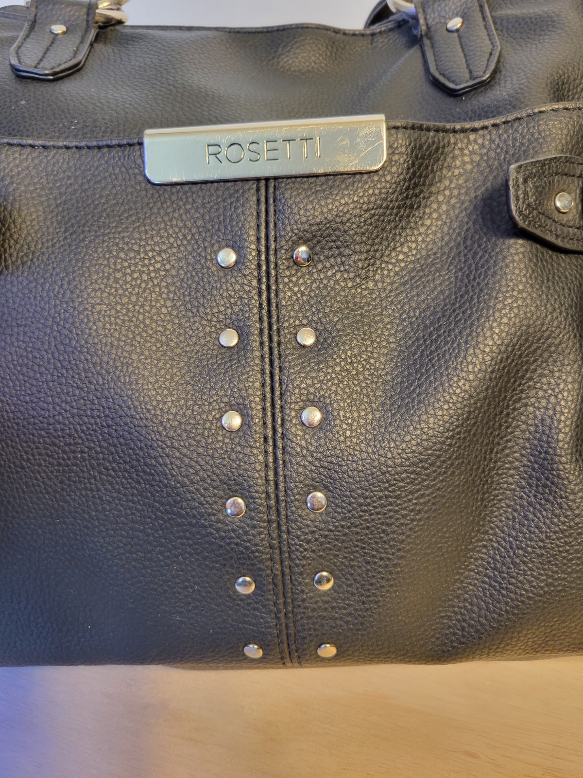 Rosetti Black Shoulder Bag Studded Buckle Accents Magnetic Zip Silver Hardware