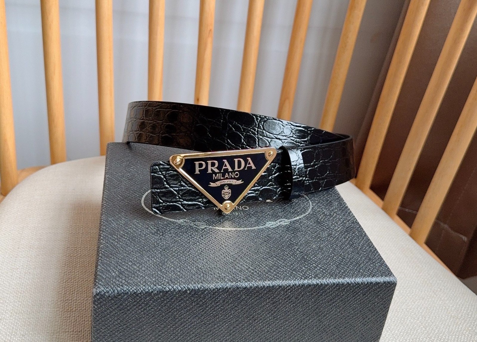 Prada men’s black-button black leather belt