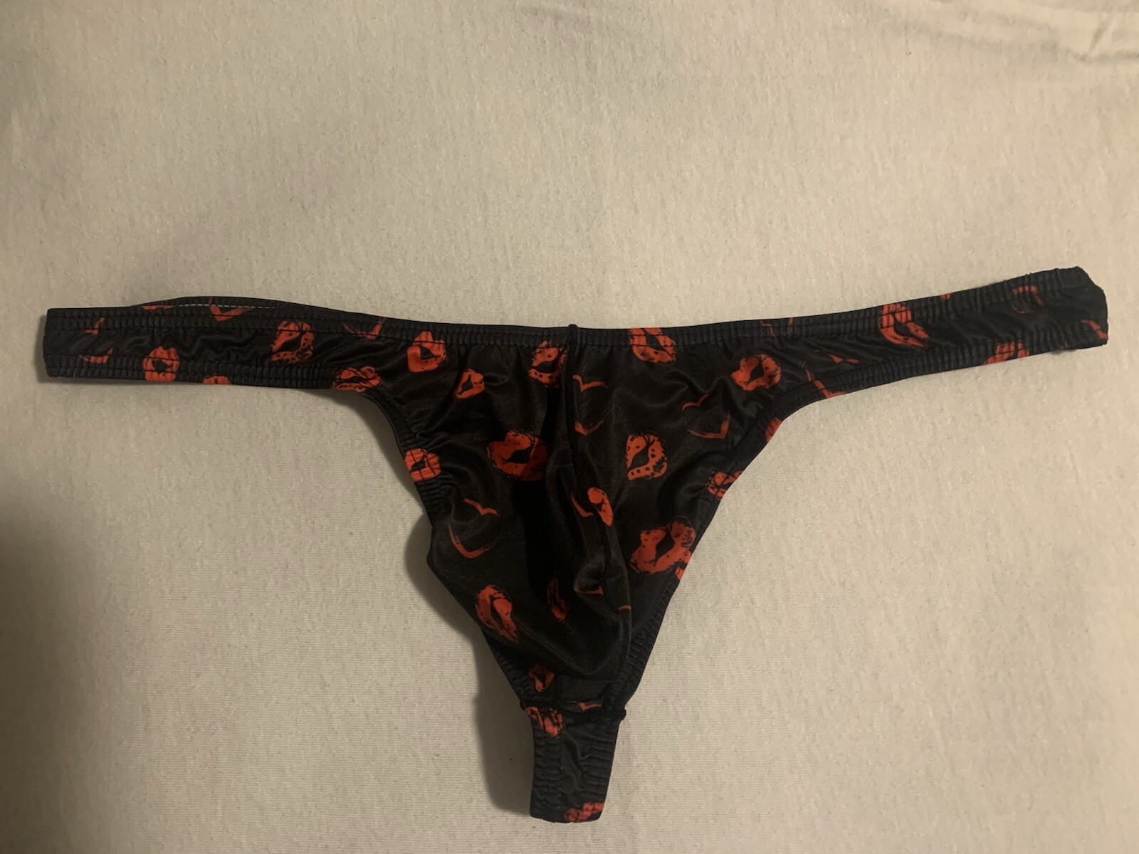Mens Kiss Pattern Black Thong. Size XL (See Details)