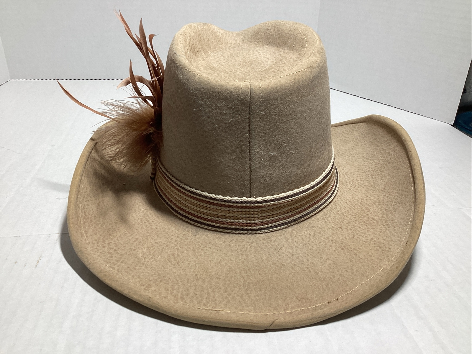 VTG Western Cowboy hat, Size Small, Head Measures 8 By 6 Inches, Tan, Feathers