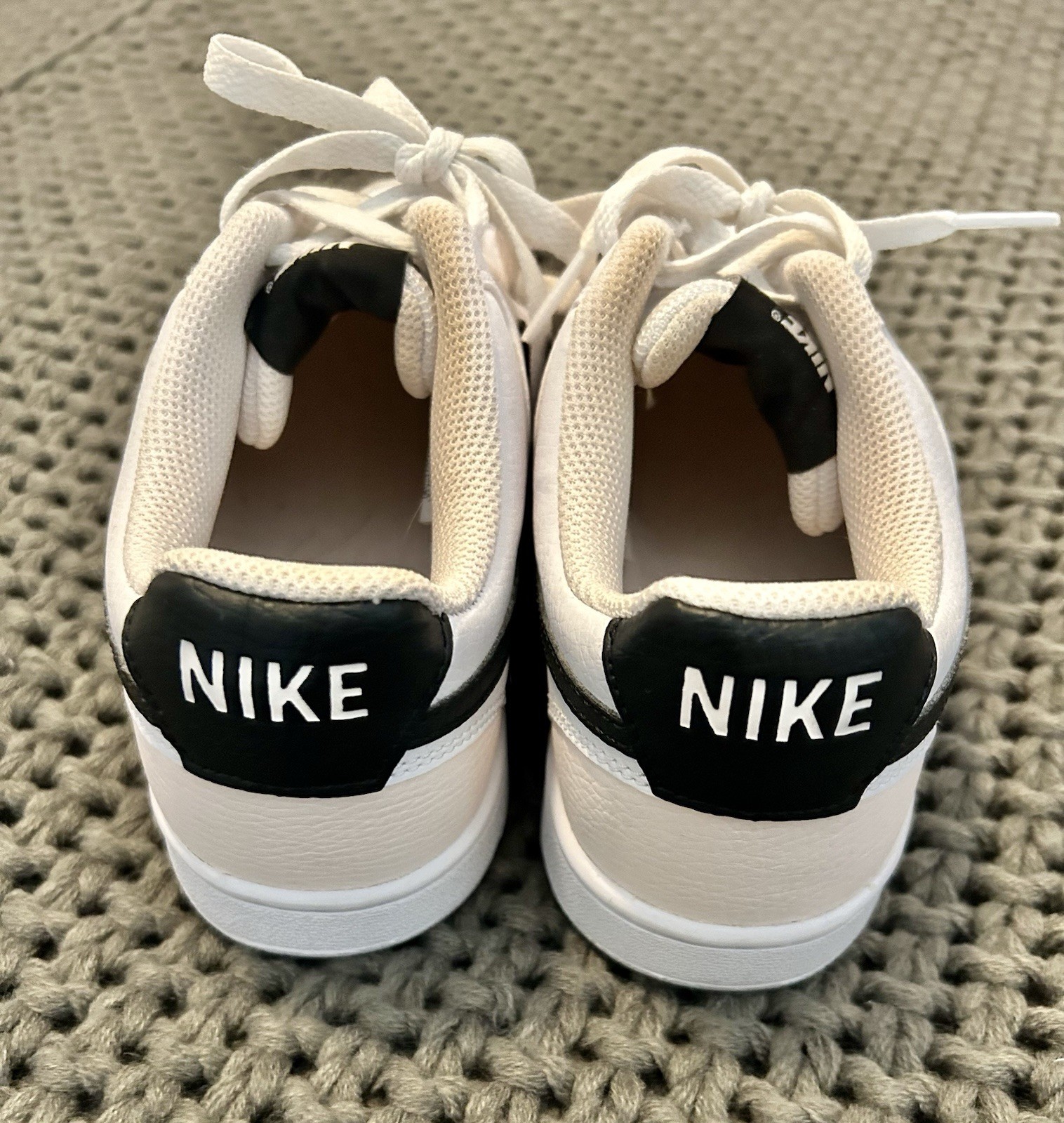 Nike Woman’s Court Vision Size 7 White with Black Swoosh Pink accents