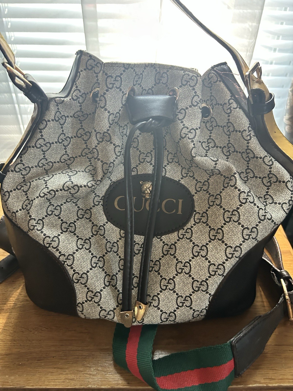 Gucci GG Pattern Drawstring Bucket Bag Beige/Black Web Strap Gold Hardware