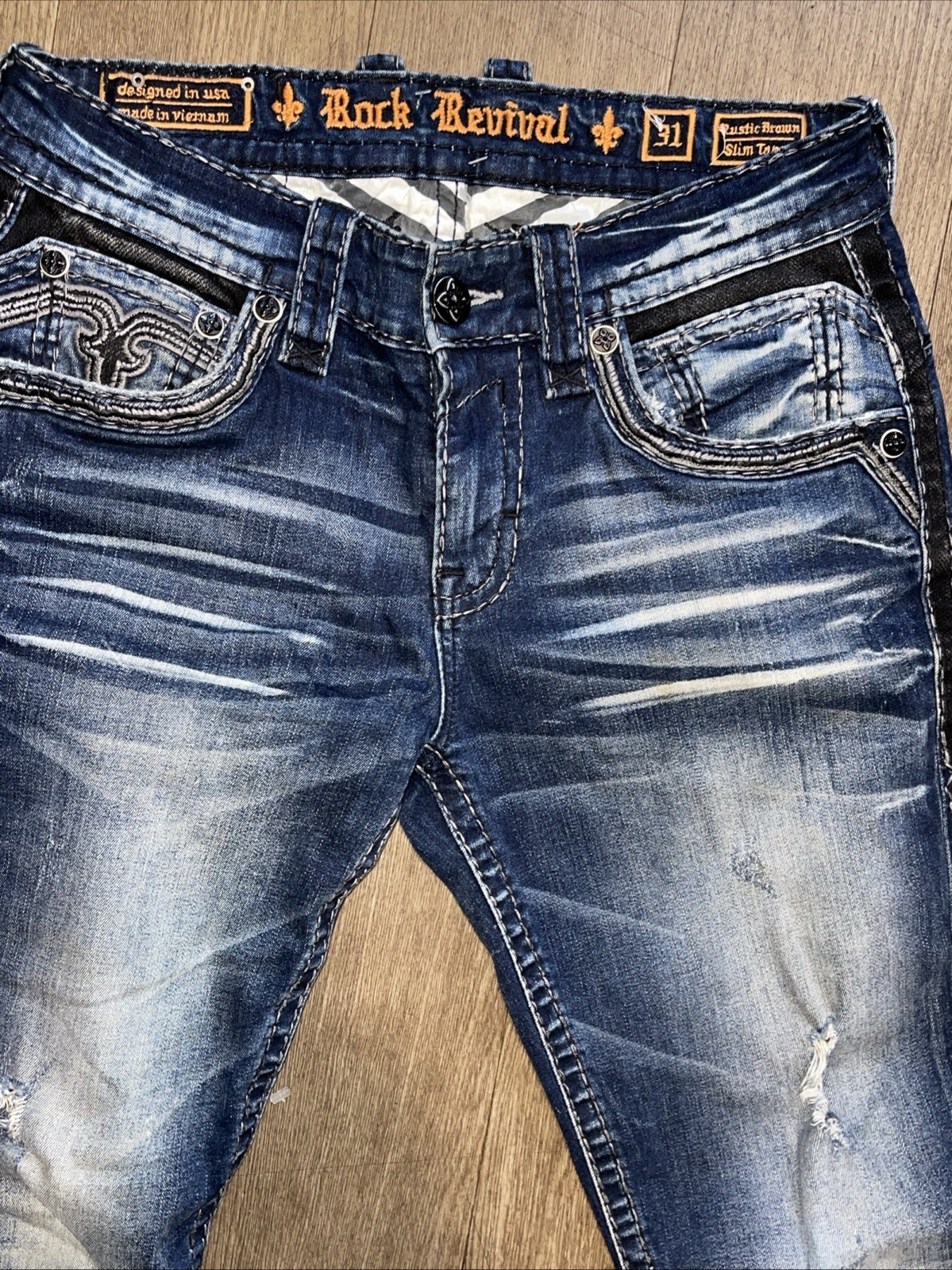 ROCK REVIVAL “ RUSTIC BROWN” Slim Taper Jeans, Size 31/31 Length ￼ Distressed