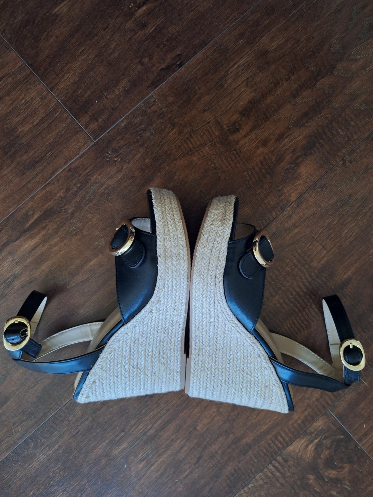 Soda brand ,black , 5 1/2 inch wedge, NEVER WORN , true to size, gold hardware.