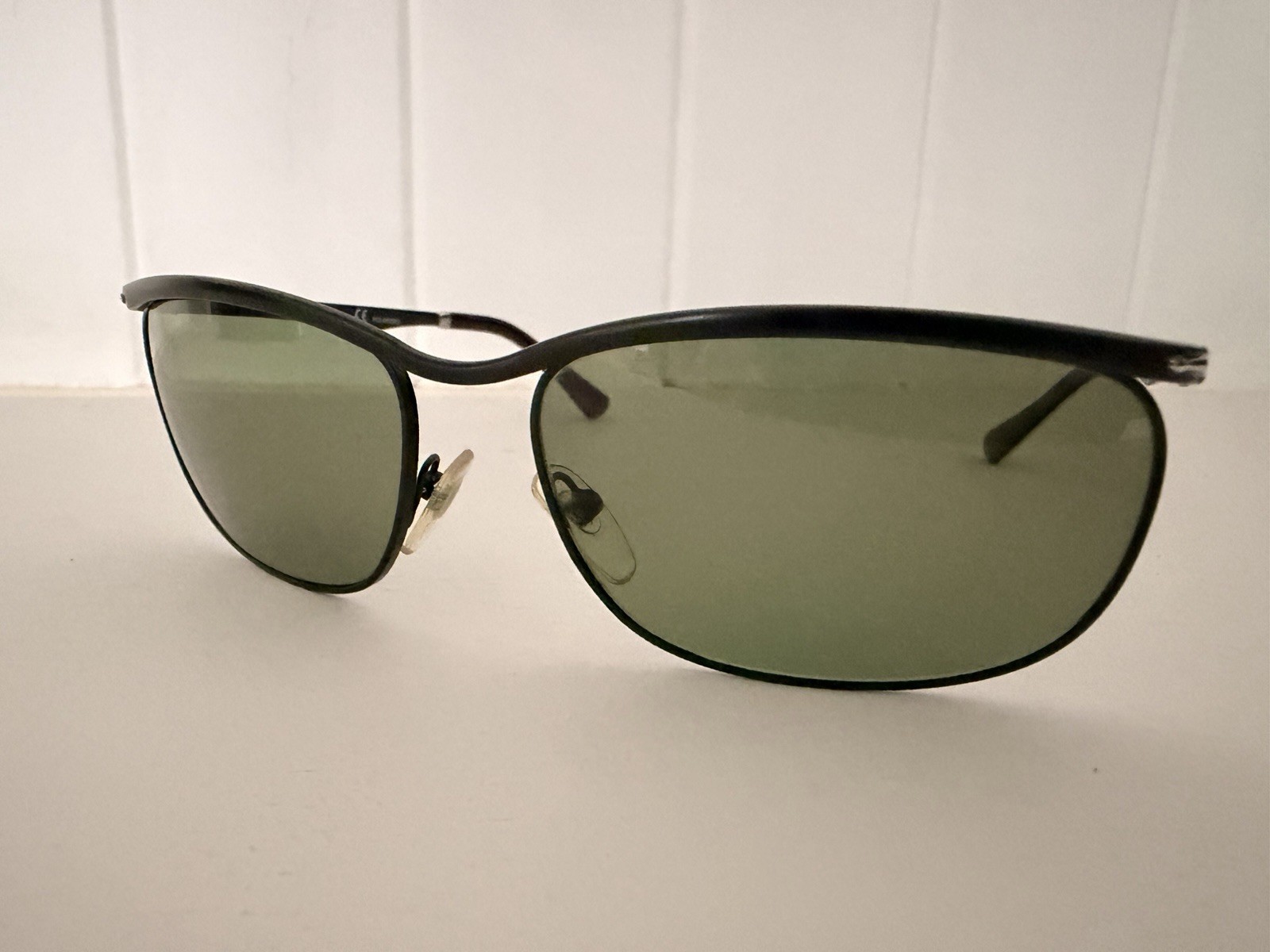Persol Key West Polarised Sunglasses Black Metal Frame Green Tinted Lenses