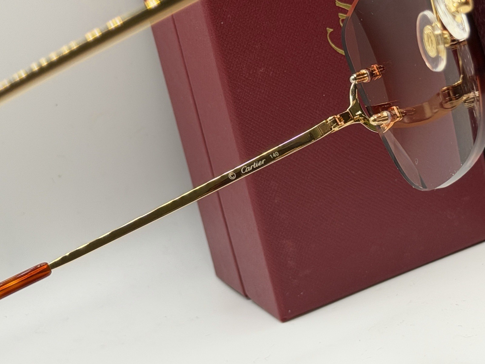 Cartier Rimless Square Gradient Red Unisex Sunglasses Gold Metal Frame CT00920