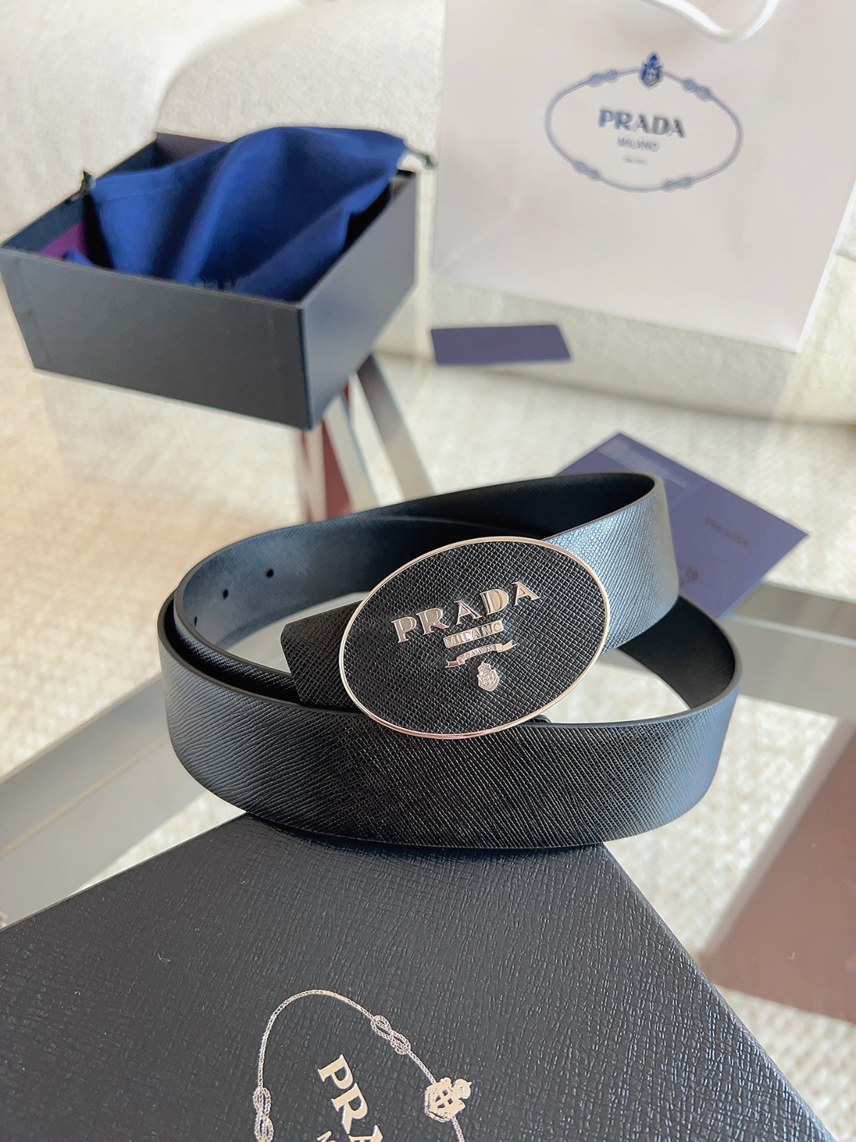 Prada men’s black-button black leather belt