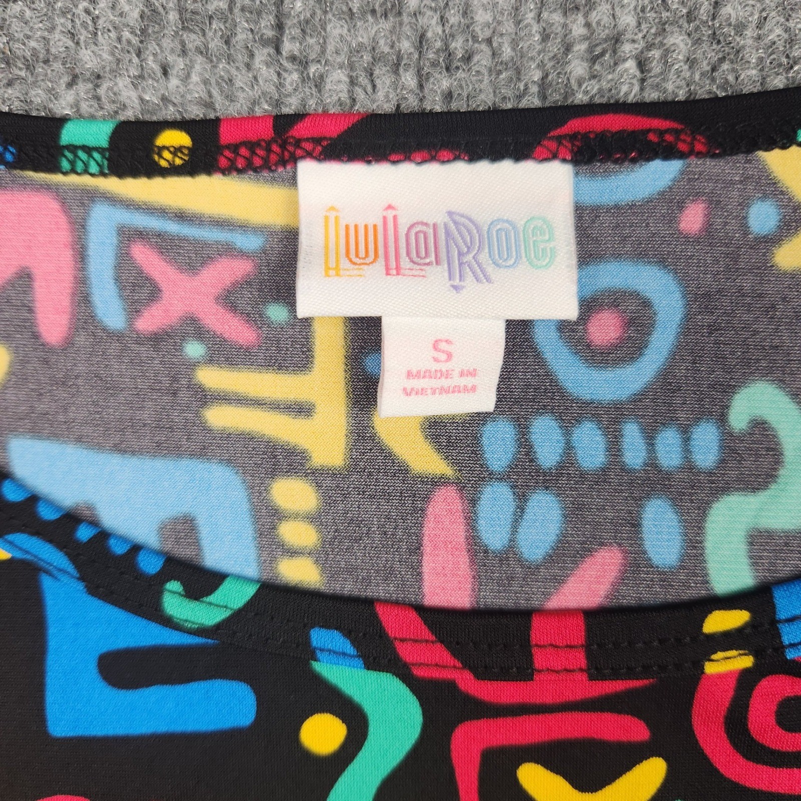 LuLaRoe Irma Tunic Top Small Black Neon 90s Abstract Doodle High Low Short Slv