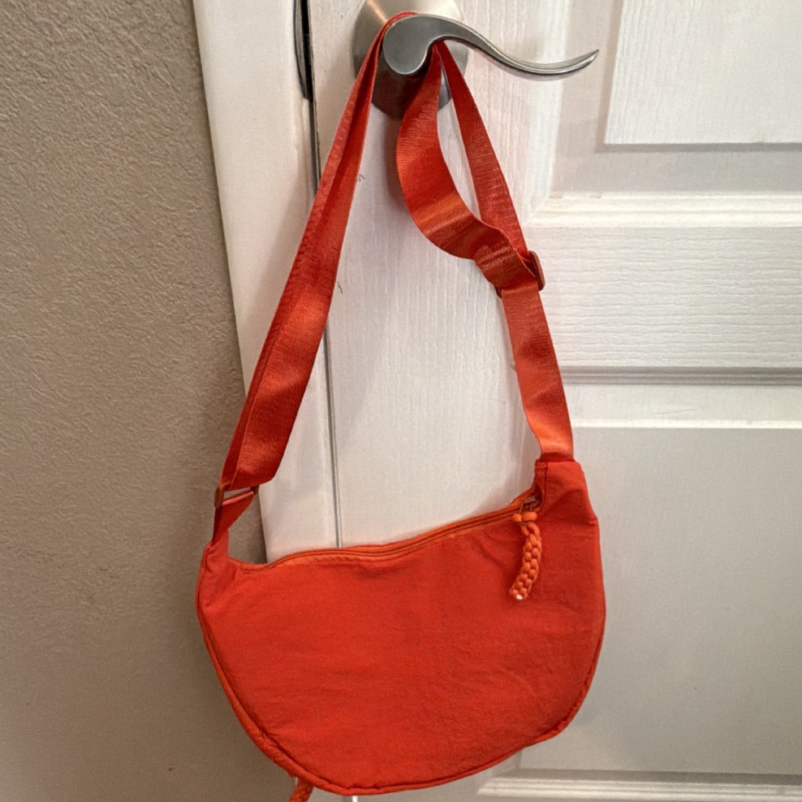 Orange Crescent Shoulder Bag Adjustable Strap Zipper Accent Outer Pockets