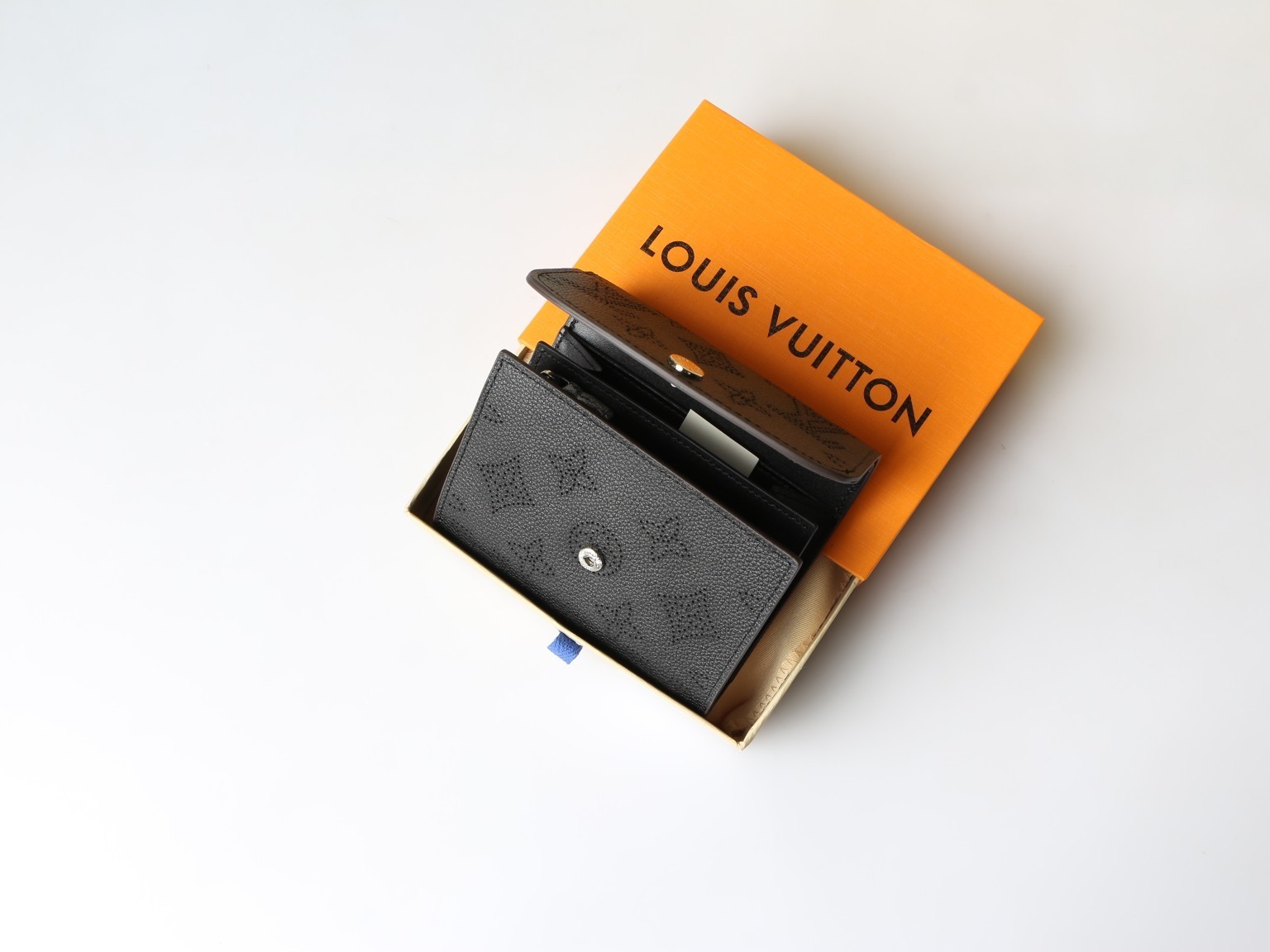 LOUIS Black Mahina Perforated Leather Iris Compact Wallet