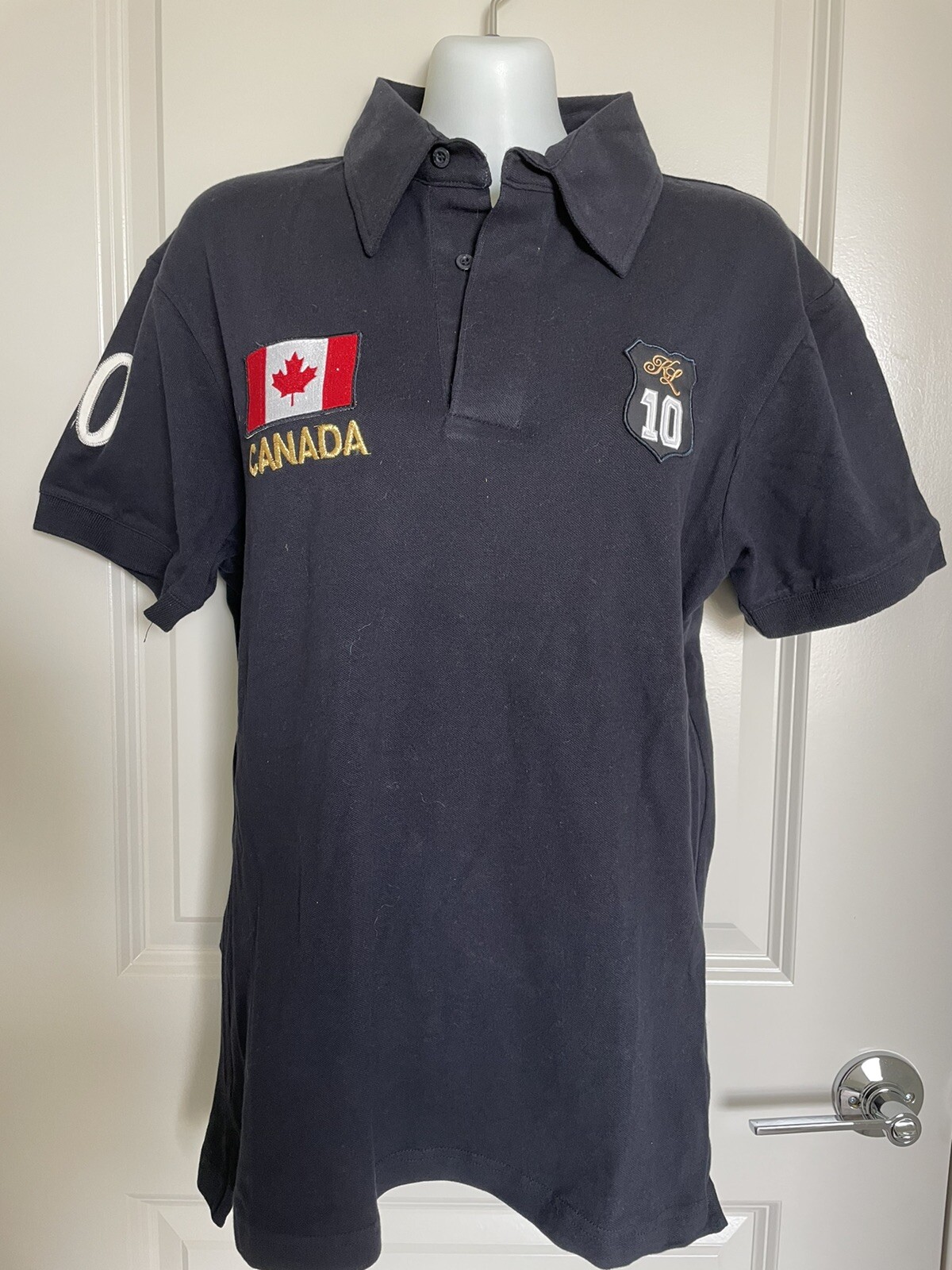Kingsland Collection Women’s Canadian #10 Navy Polo Shirt- Medium
