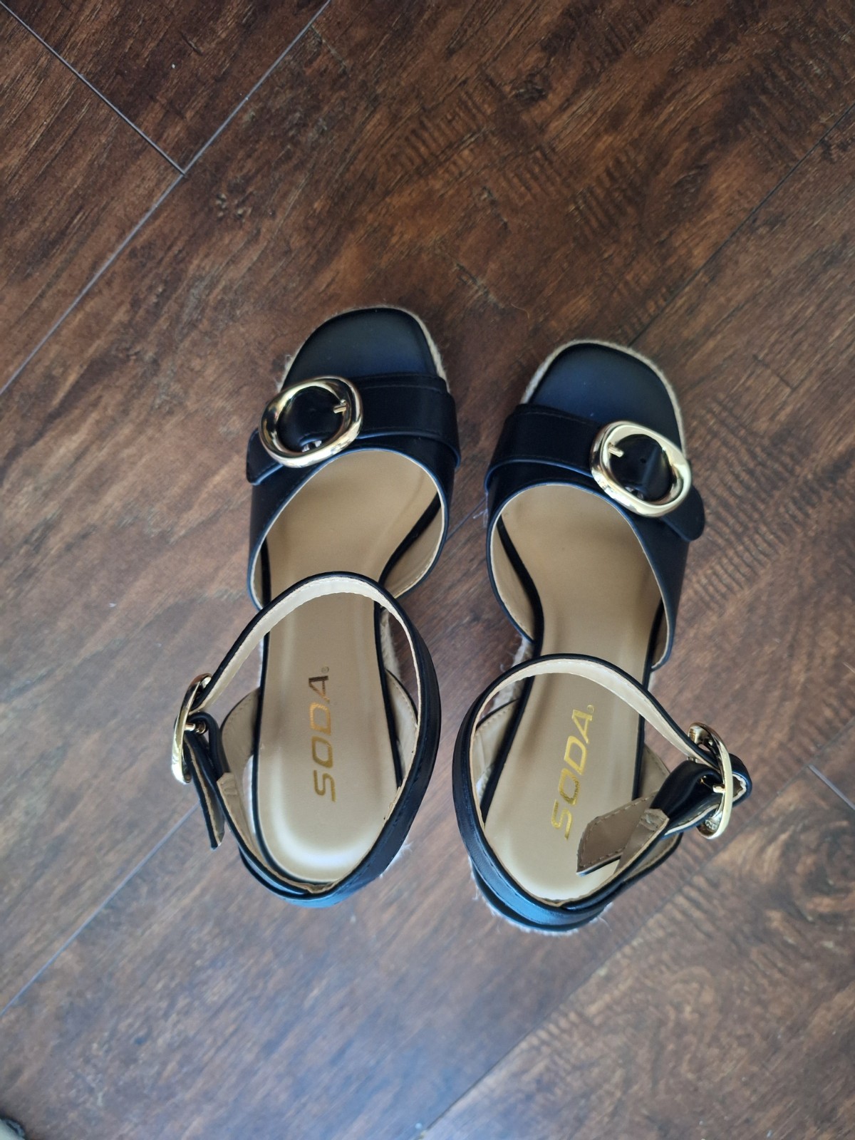 Soda brand ,black , 5 1/2 inch wedge, NEVER WORN , true to size, gold hardware.
