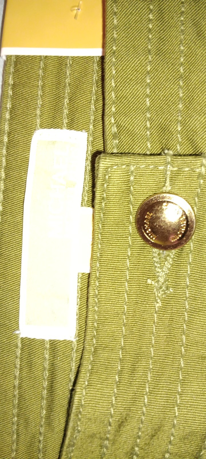 Women’s Michael Kors Brand New w tags. size 4 Capri dressy Olive green w pockets