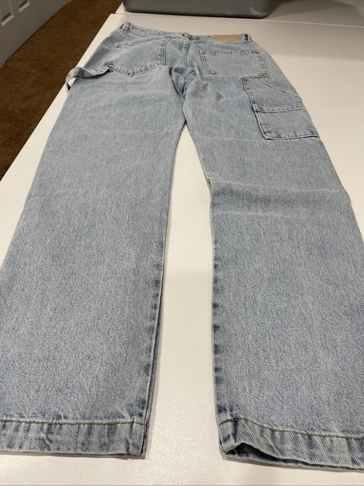 The Couture Club carpenter rivet detail jeans in blue wash 30R
