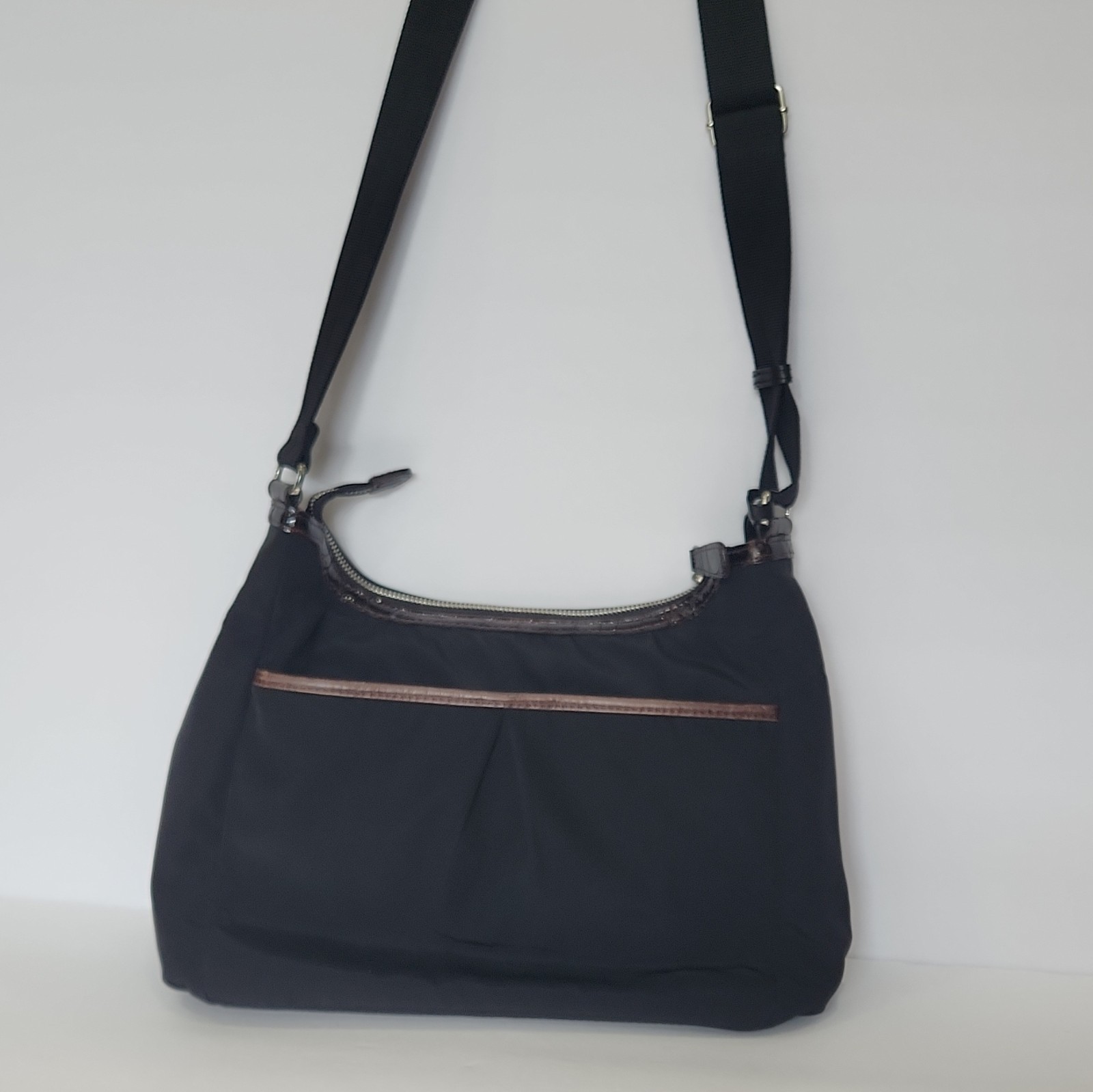 Brighton Black Crossbody Bag, Adjustable Strap, Zip, Pockets, Charm