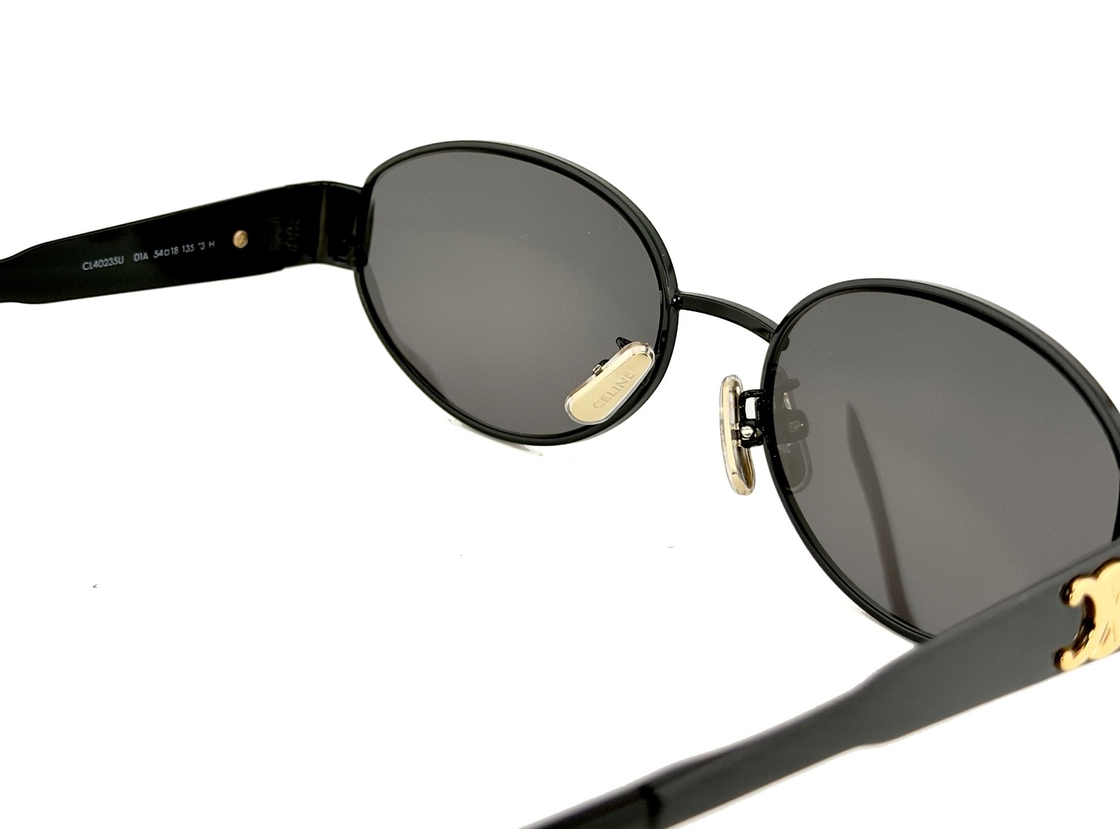 CELINE CL40235U 40235 METAL TRIOMPHE Black Gold Logo Oval Unisex Sunglasses 01A