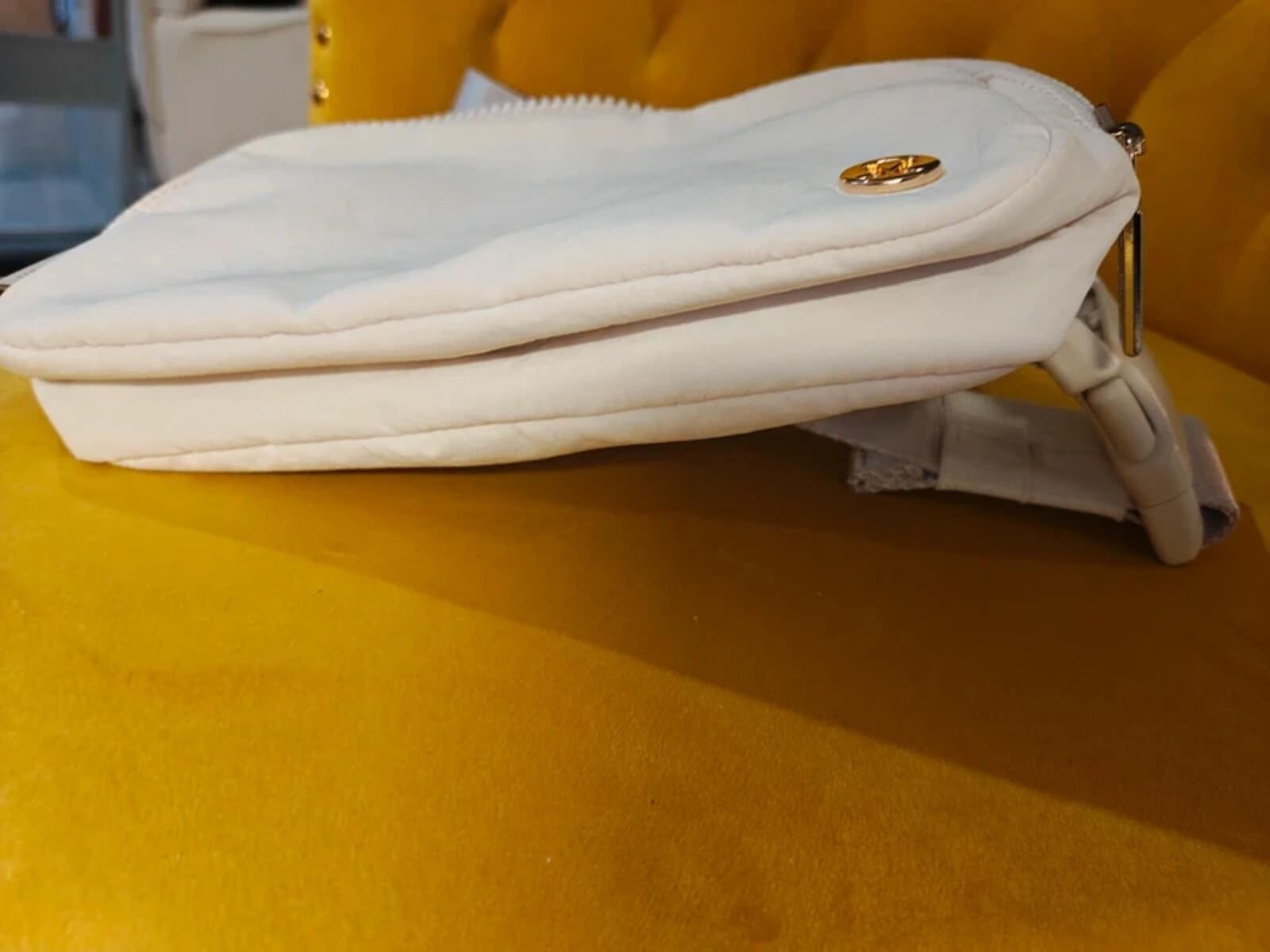 Lululemon belt bag with bold Metallic gold Logo