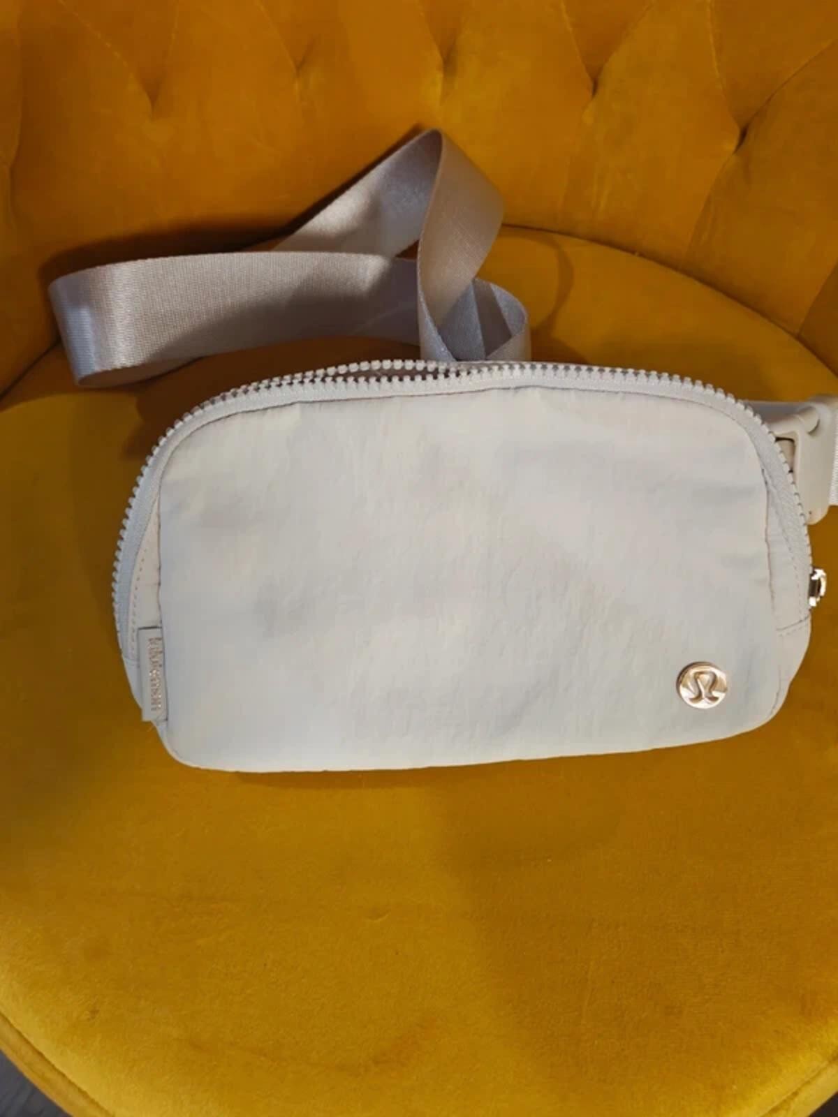 Lululemon belt bag with bold Metallic gold Logo