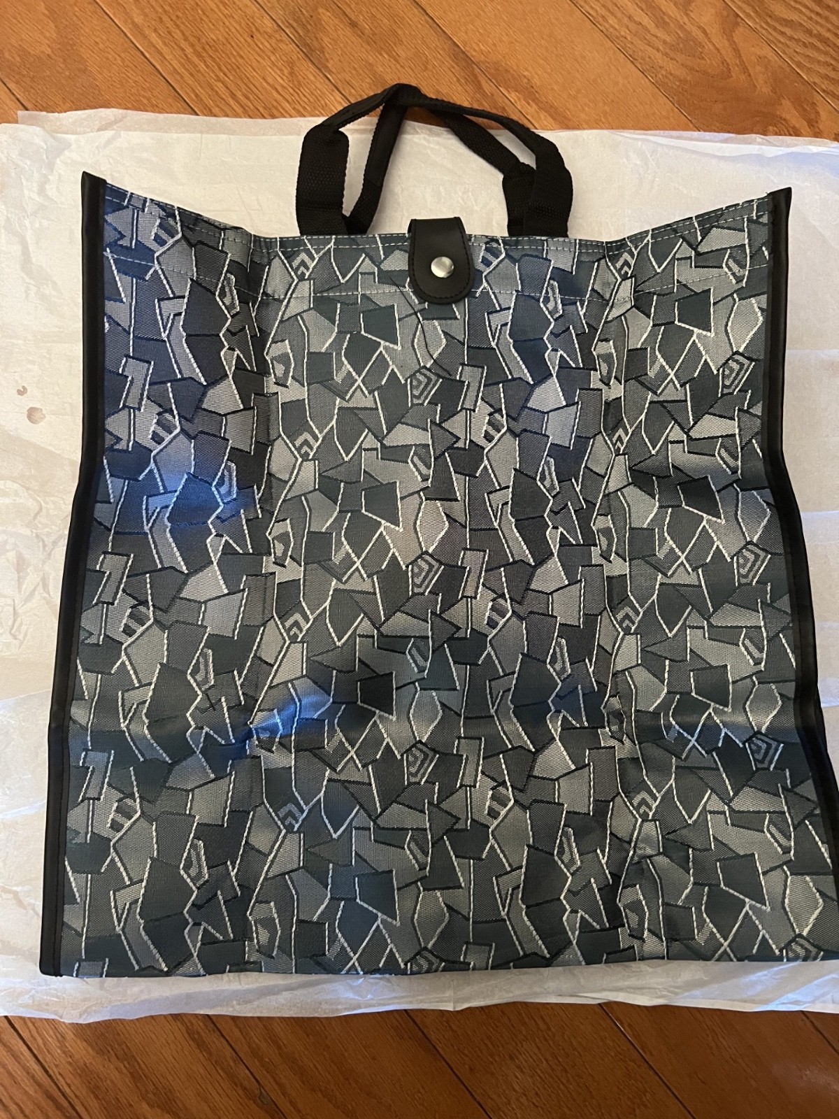 Denim Blue Fabric Folding Tote Bag w/ handles & snap closure. Size 15 X 15″.