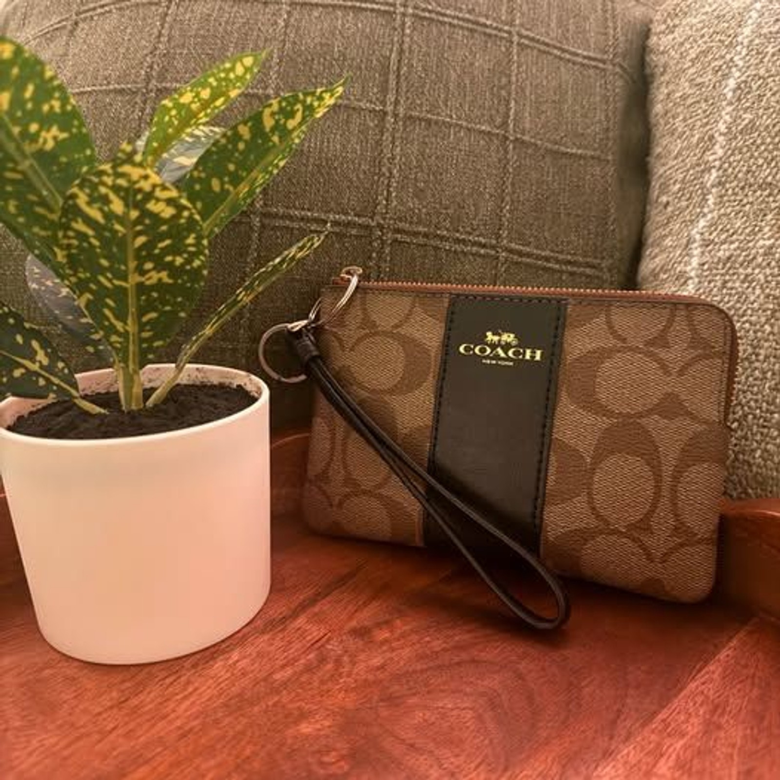 Coach wristlet with black accents