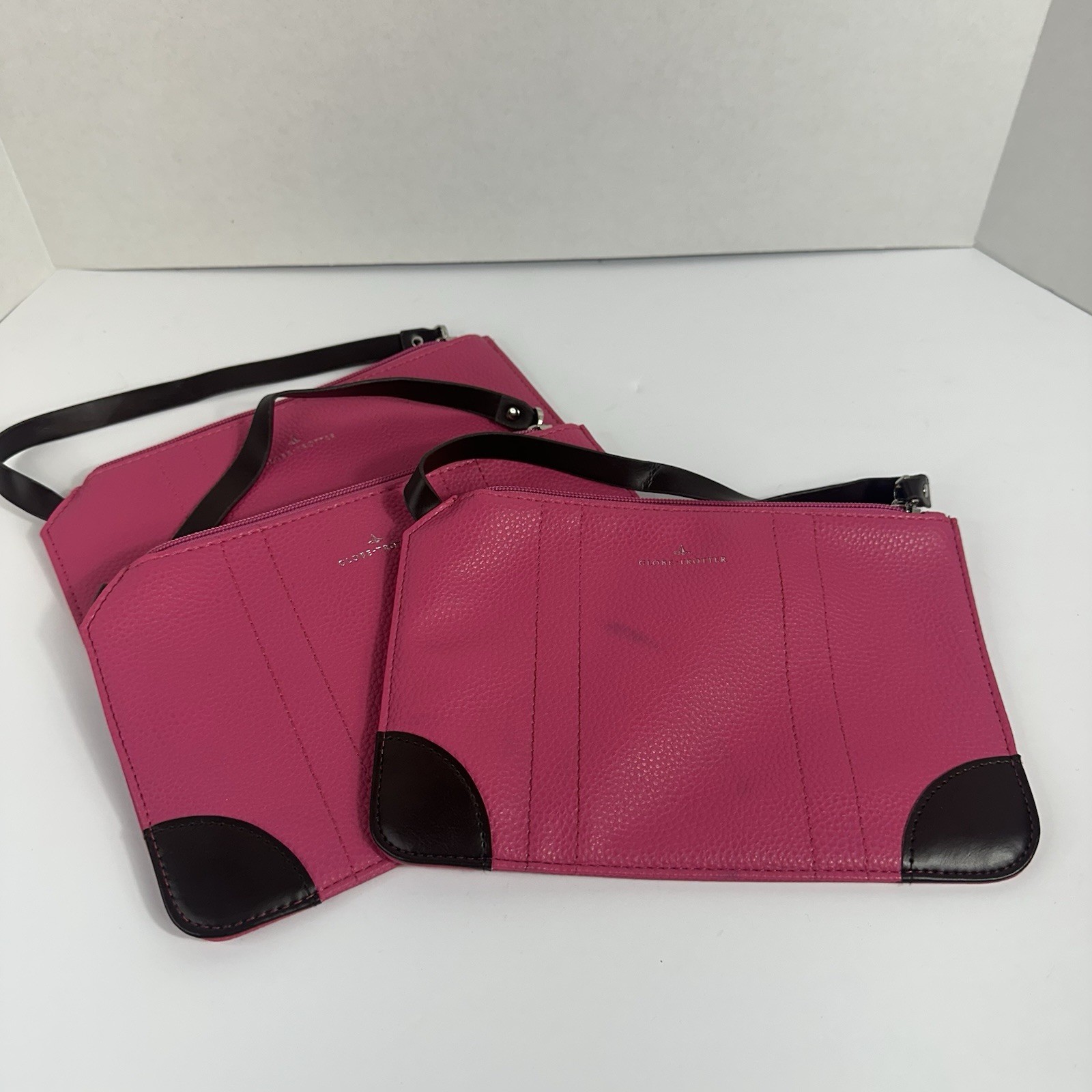 Globe-Trotter x ANA Pink Zip Wristlet Clutch, Black Strap, Geometric Lined