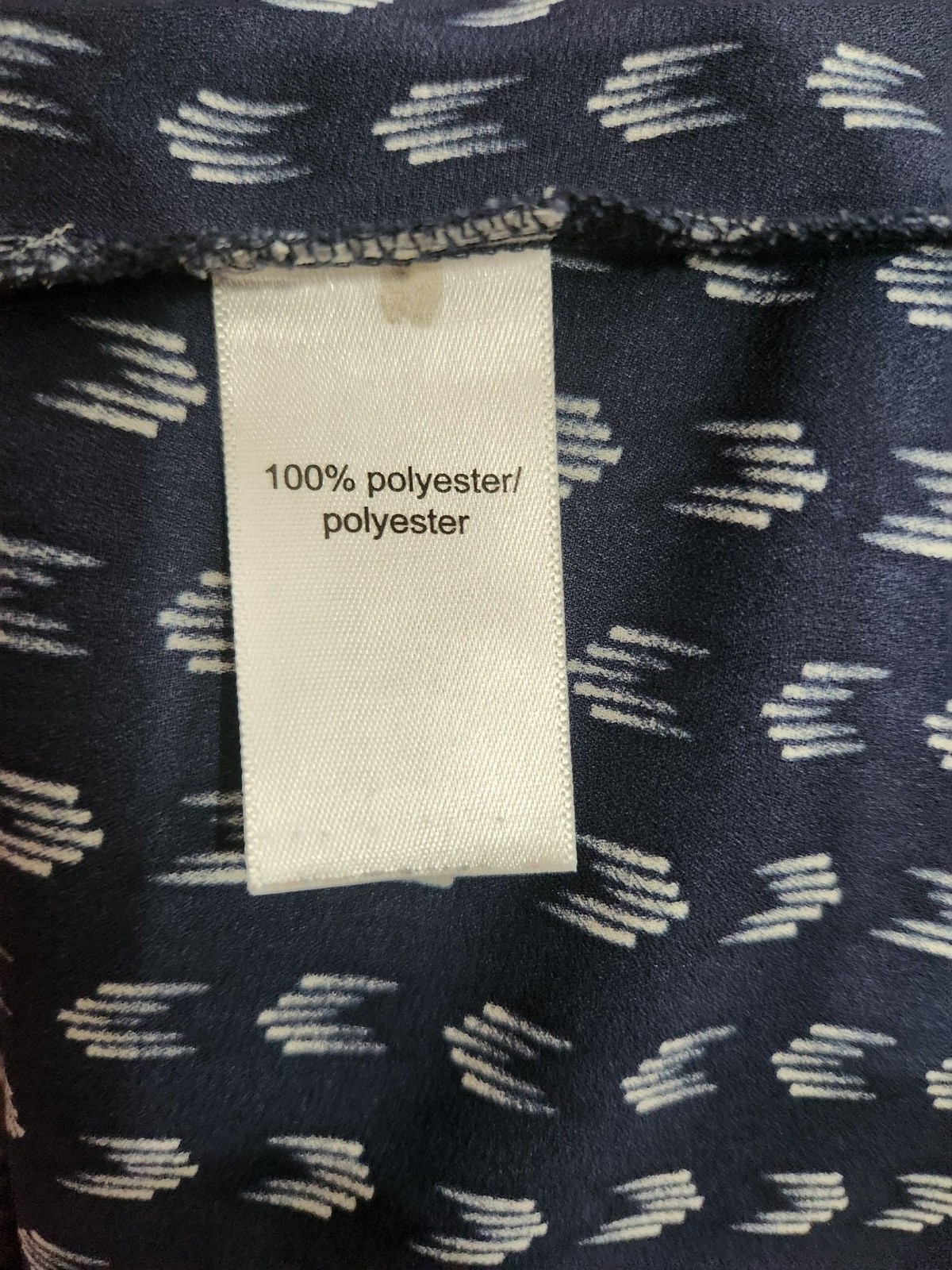 maurices navy blue and white ikat print v-neck blouse with chest pocket