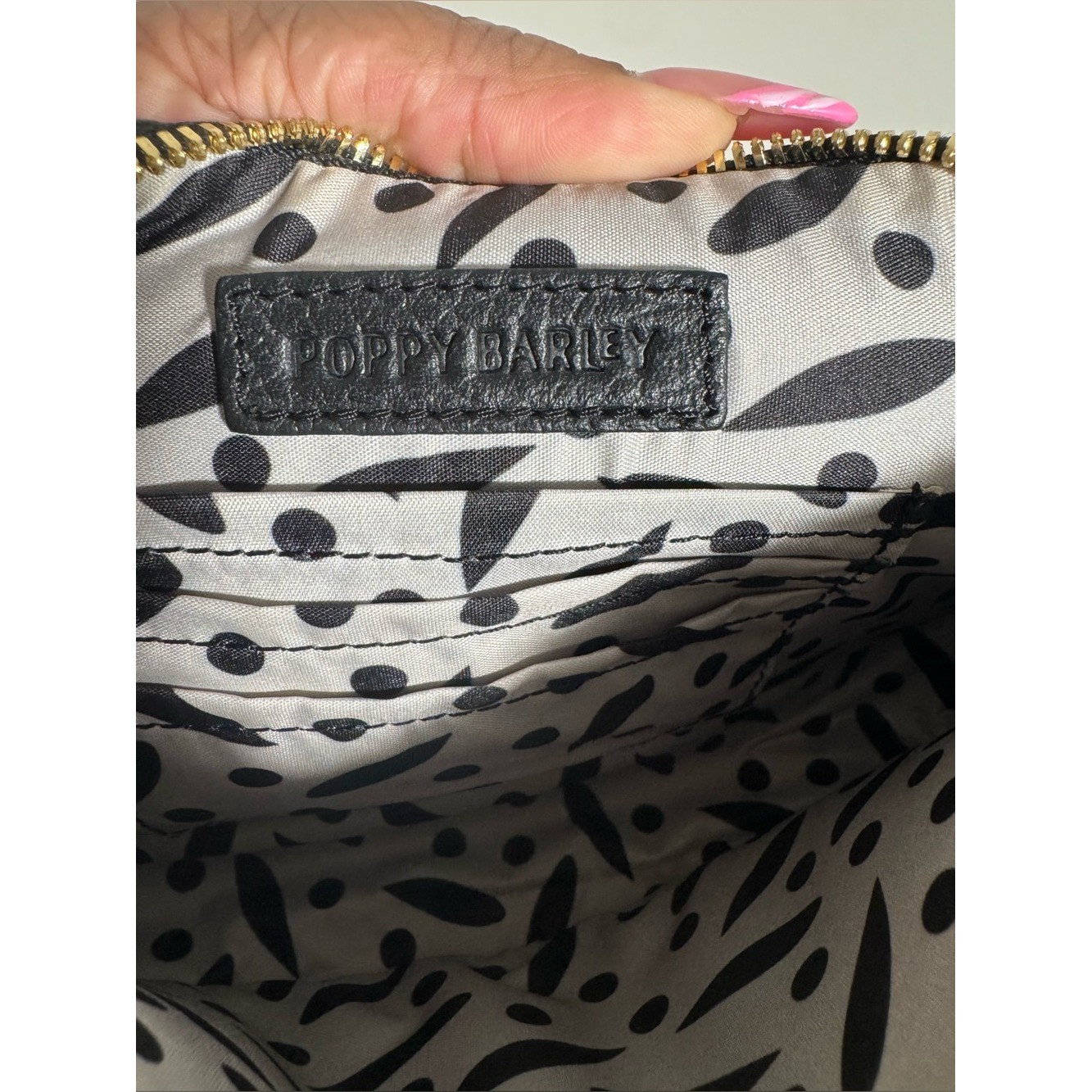 Poppy Barley The classic baguette black leather bag