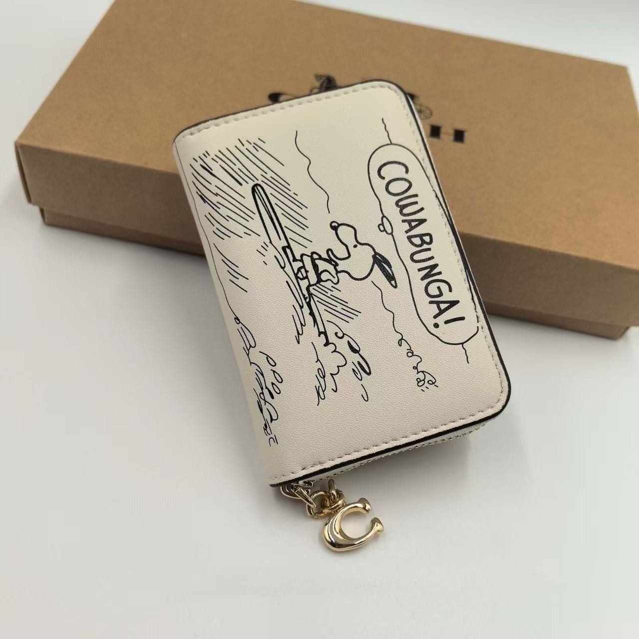 Coach X Peanuts Snap Wallet In Signature Canvas With Snoopy Print CCB18