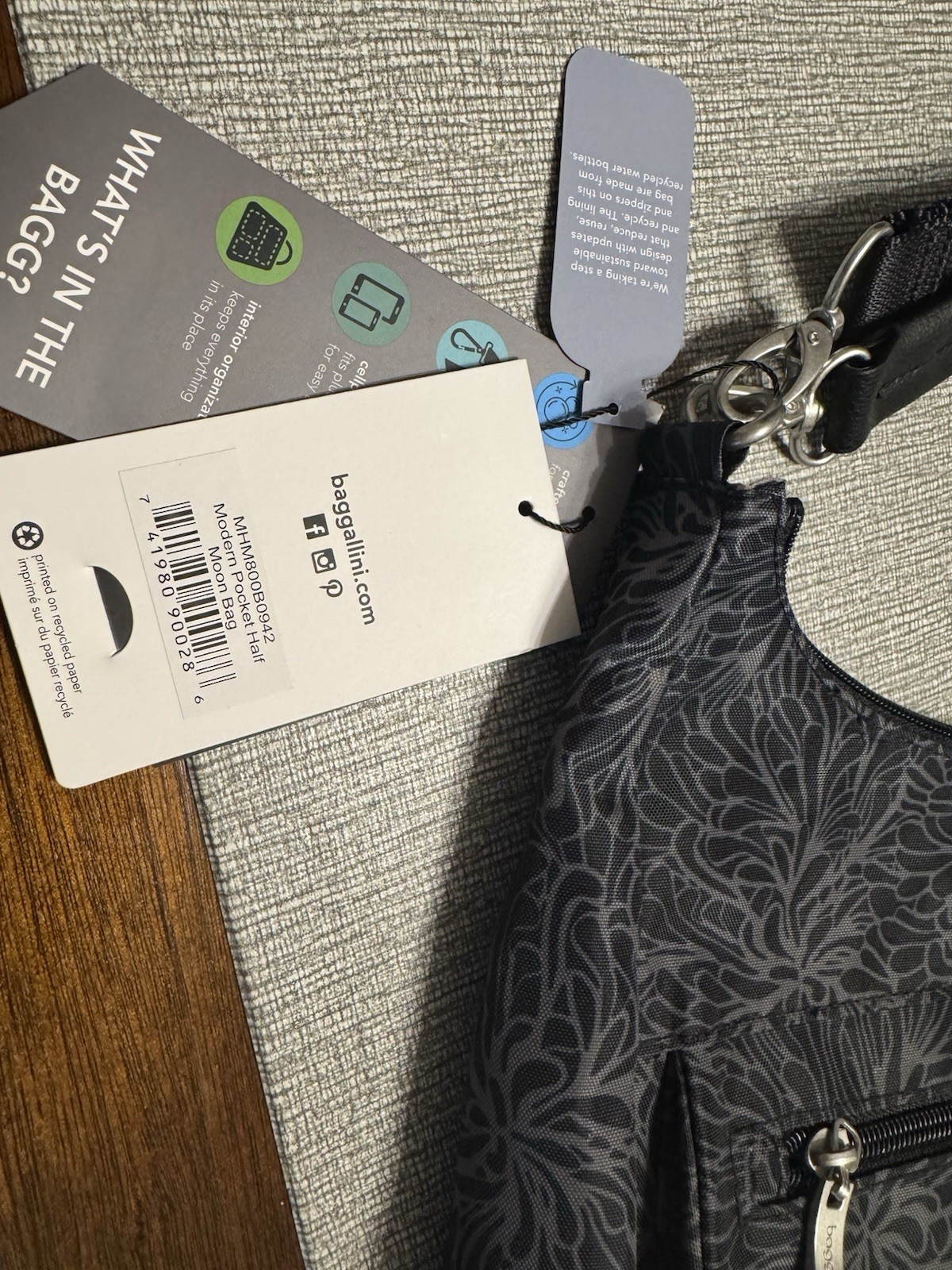 NWT Baggallini Modern pocket half moon crossbody in Midnight Blossom