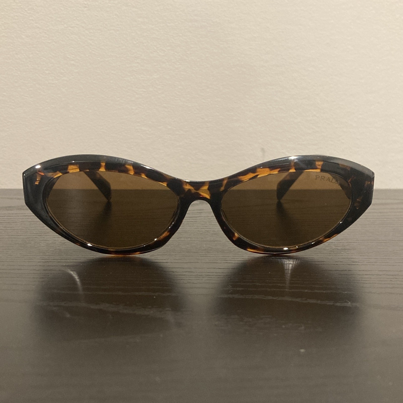 PRADA Women’s Tortoise Shell Oval Sunglasses Brown Plastic Tinted Lens