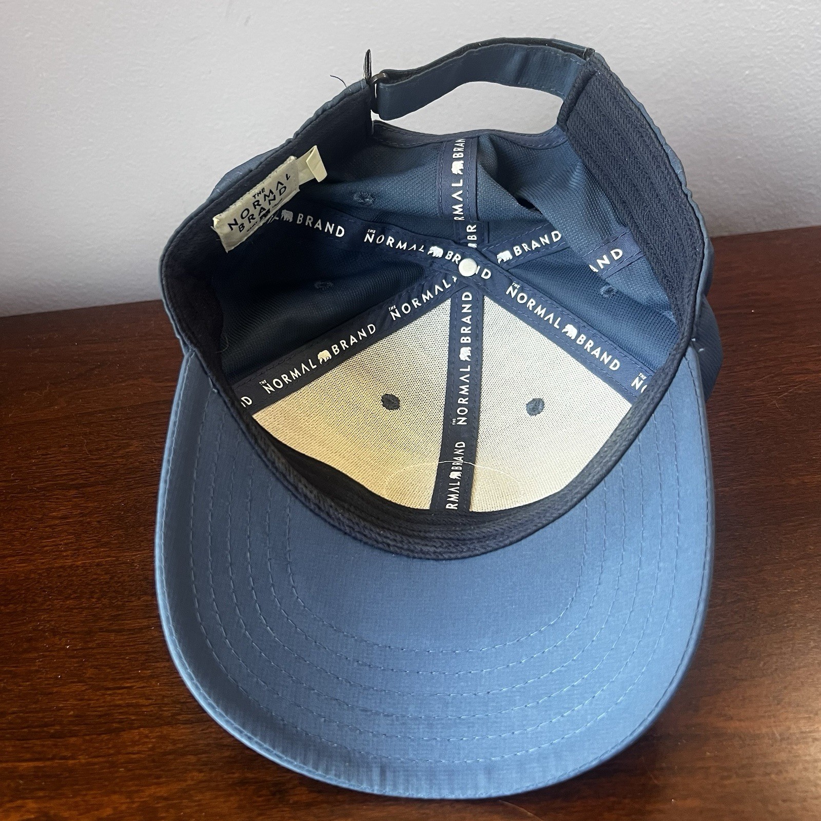 The Normal Brand Strap Hook And Loop Back Hat Cap OSFA Navy Red Bear Logo EUC