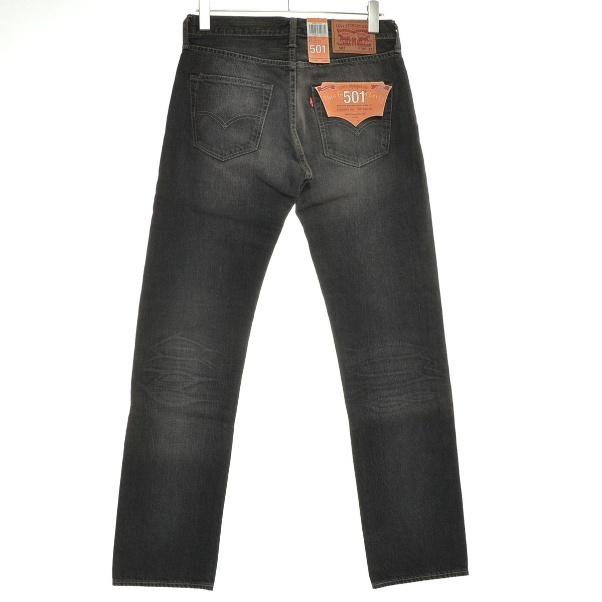 Unused LEVI’S denim jeans, model number 00501-1615, size W30, gray.