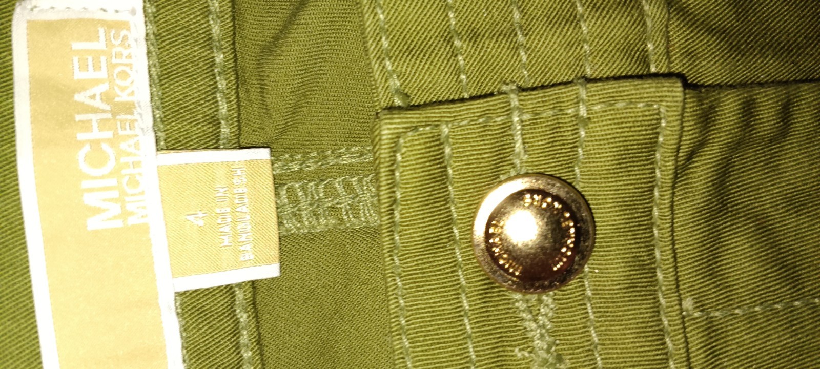 Women’s Michael Kors Brand New w tags. size 4 Capri dressy Olive green w pockets