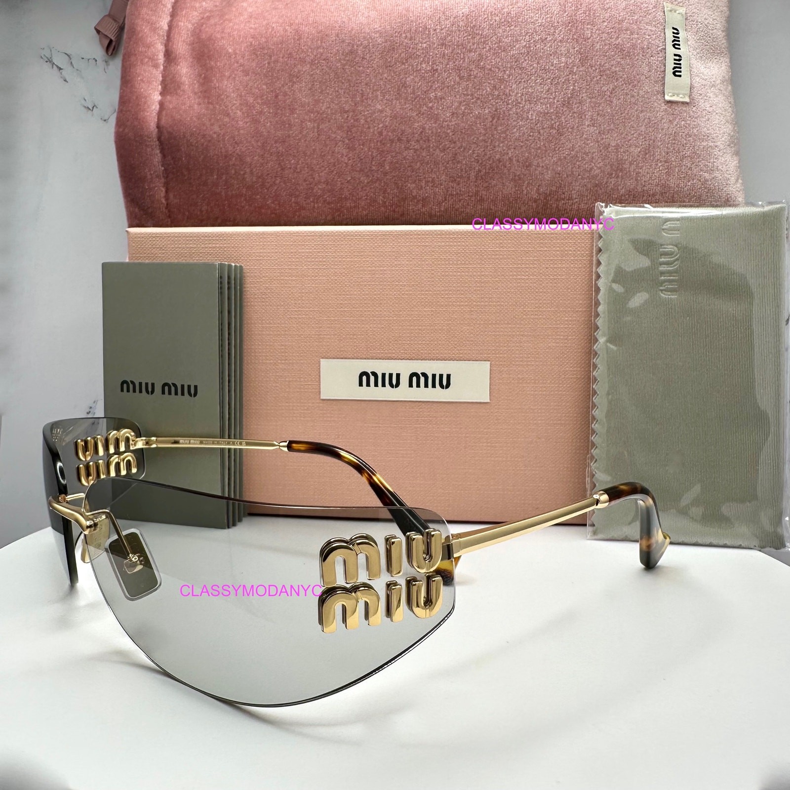 New MIU MIU Sunglasses Gold Slim Runway Wrap Rimless MU A51S 5AK50K Authentic