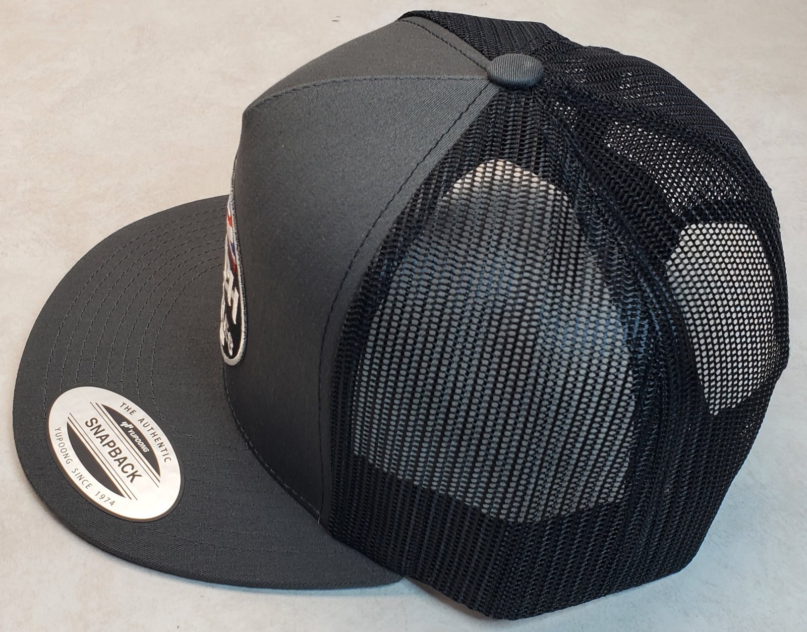 Triumph Motorcycles Embroidered Patch Trucker Hat/YP Classics 6006 Charc/Black