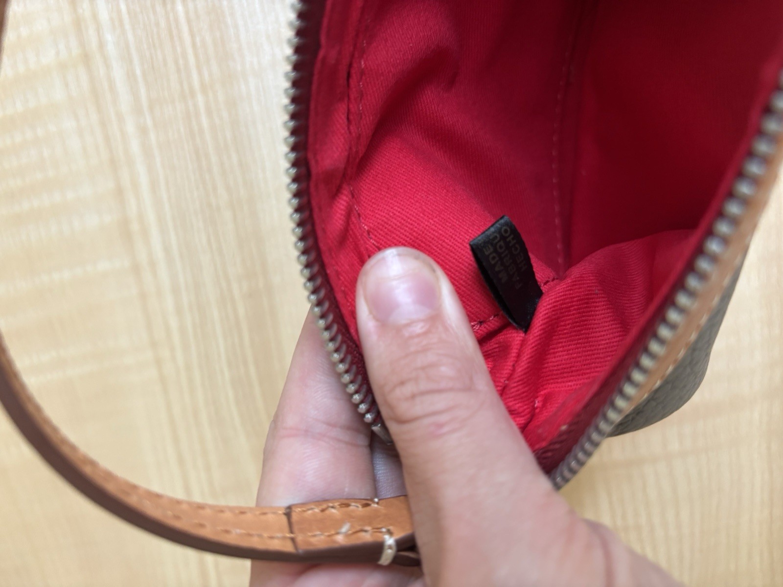 Dooney & Bourke Pebbled Zip Top mini bag with Brown Tan Detachable Strap Tassel