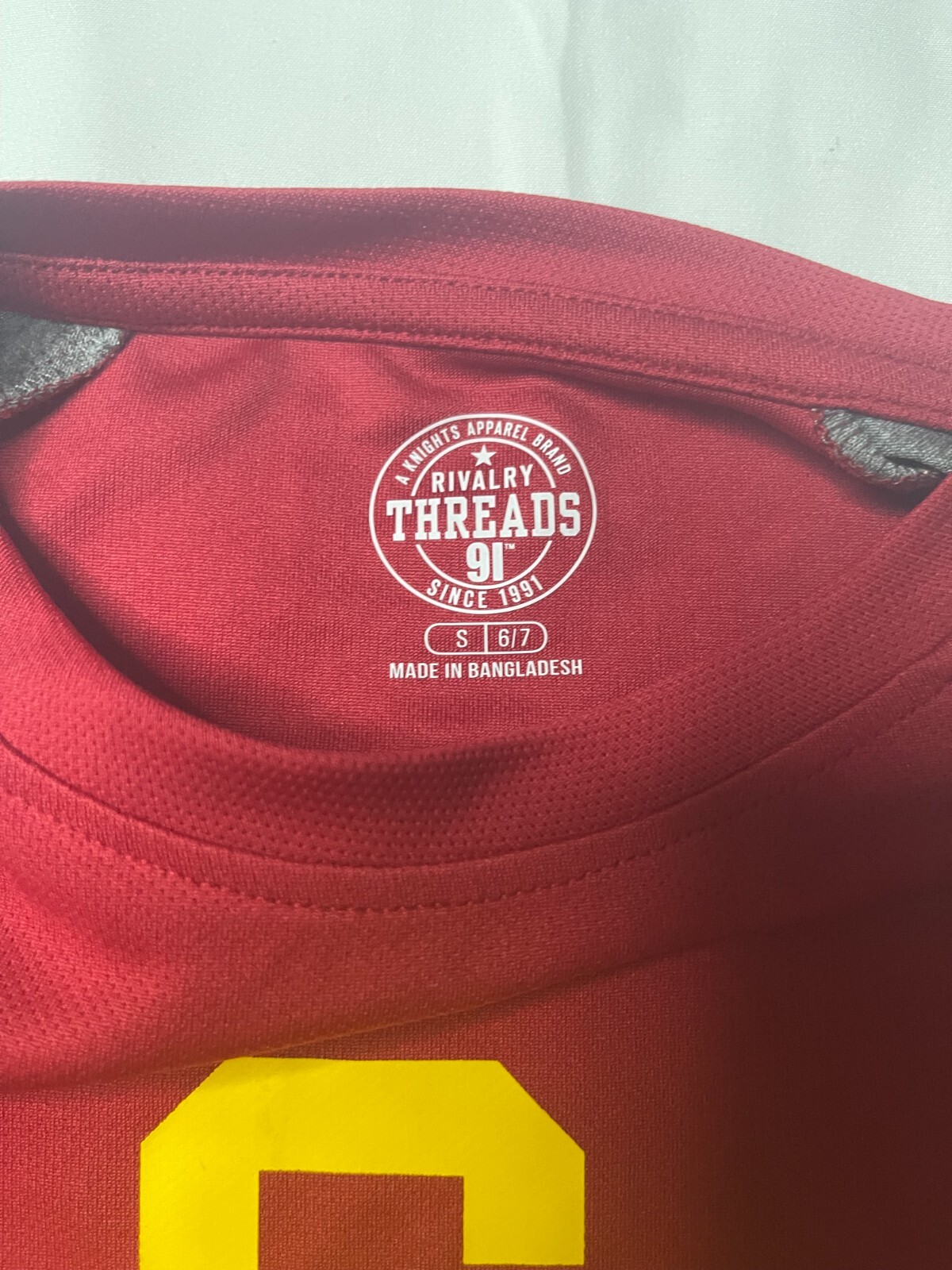 Rivalry THREADS 91. Children’s pullover size S (6/7). In red. Made in Banglades