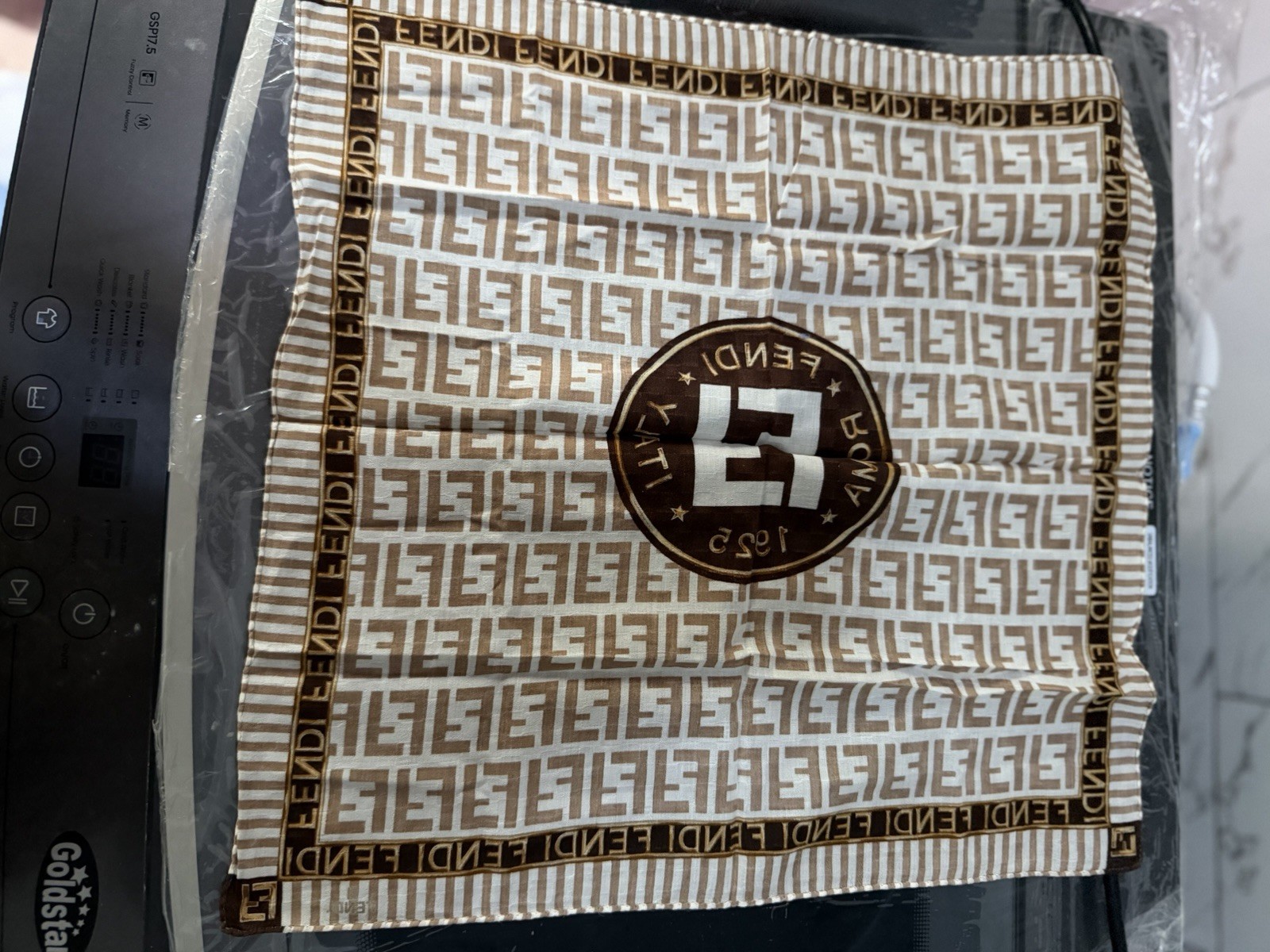 Authentic Fendi Brown/white FF stripe scarf with “FENDI ROMA 1925” seal?