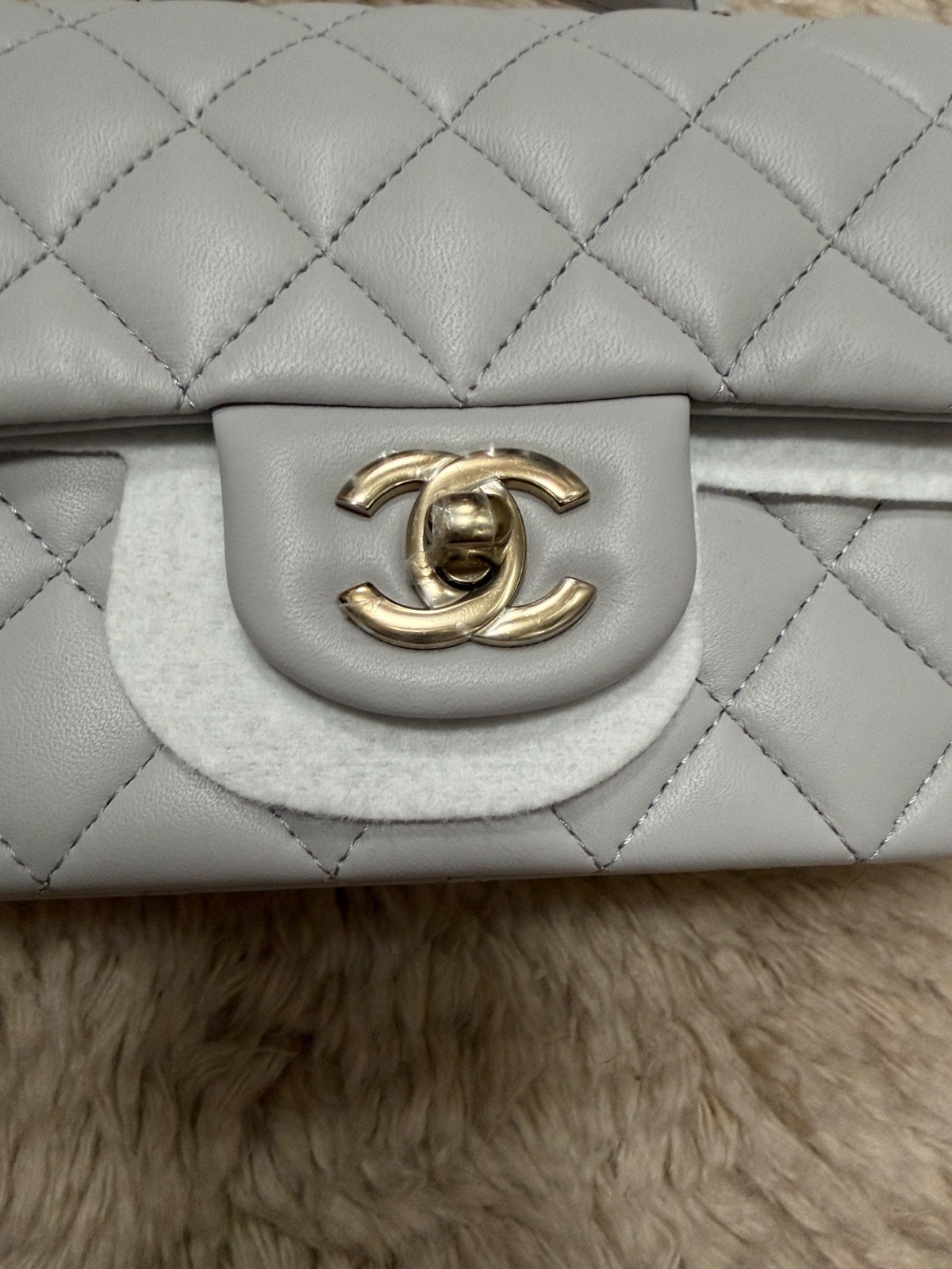 Never used! Chanel gray Mini Flap Bag with Top Handle