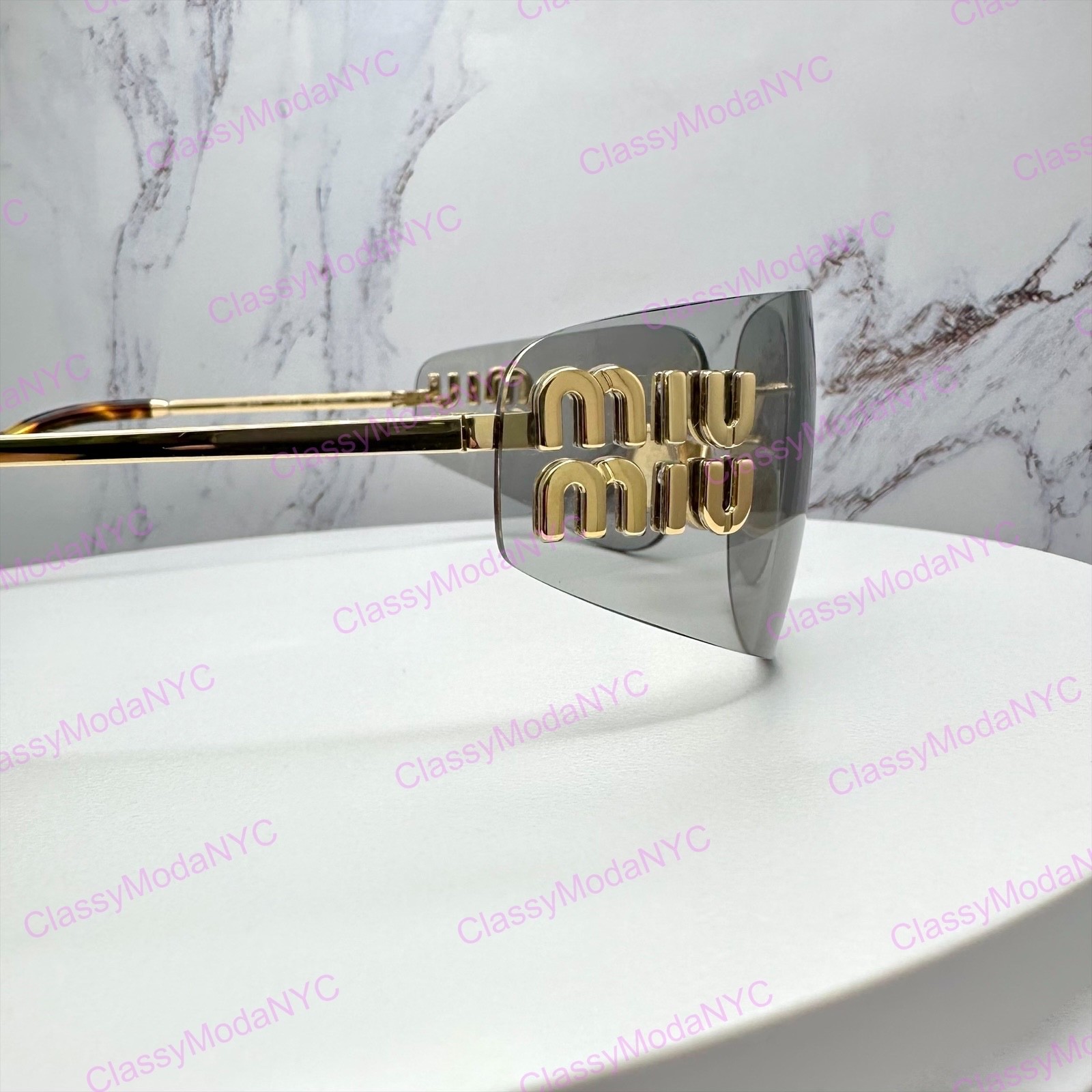 New MIU MIU Sunglasses Gold Slim Runway Wrap Rimless MU A51S 5AK50K Authentic