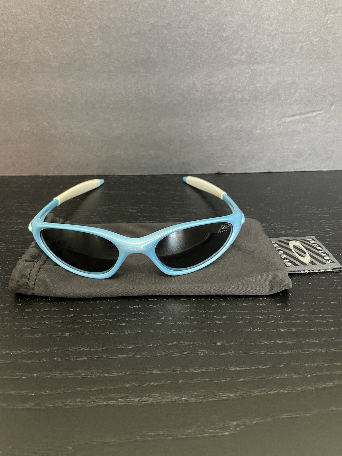 Oakley Minute 1.0 Sunglasses Powder Blue Frame, Black Iridium Lens