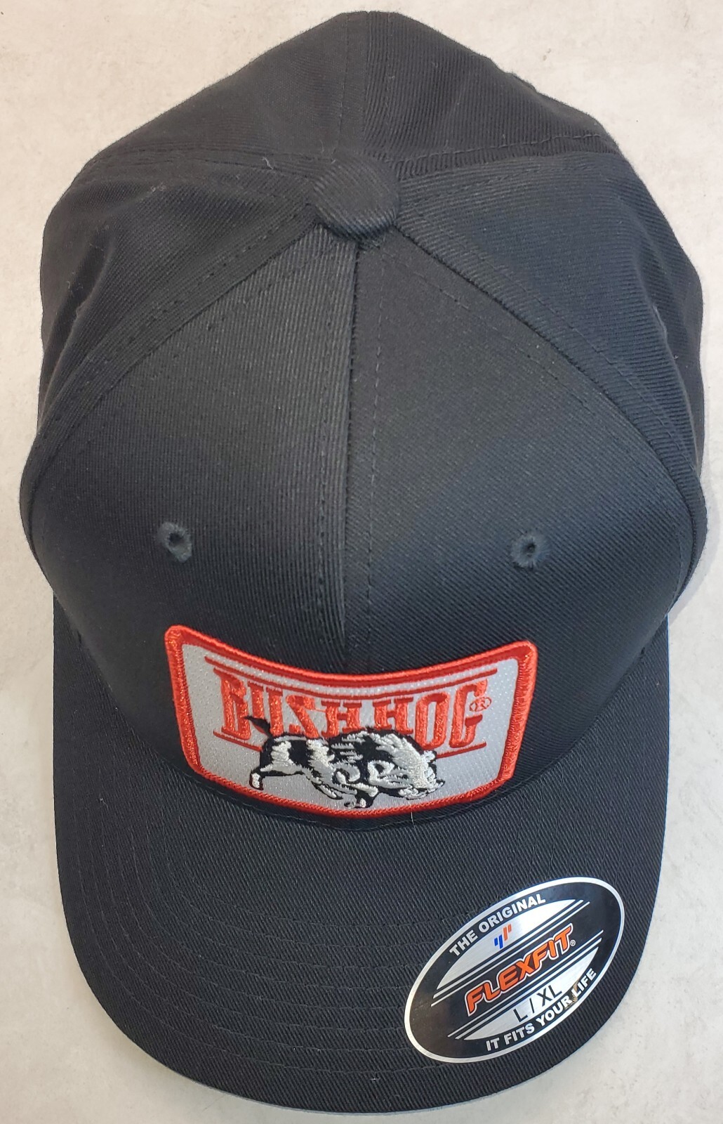 Bush Hog Patch on Flexfit 6277 Black Hat L/XL 7 1/8 – 7 5/8″