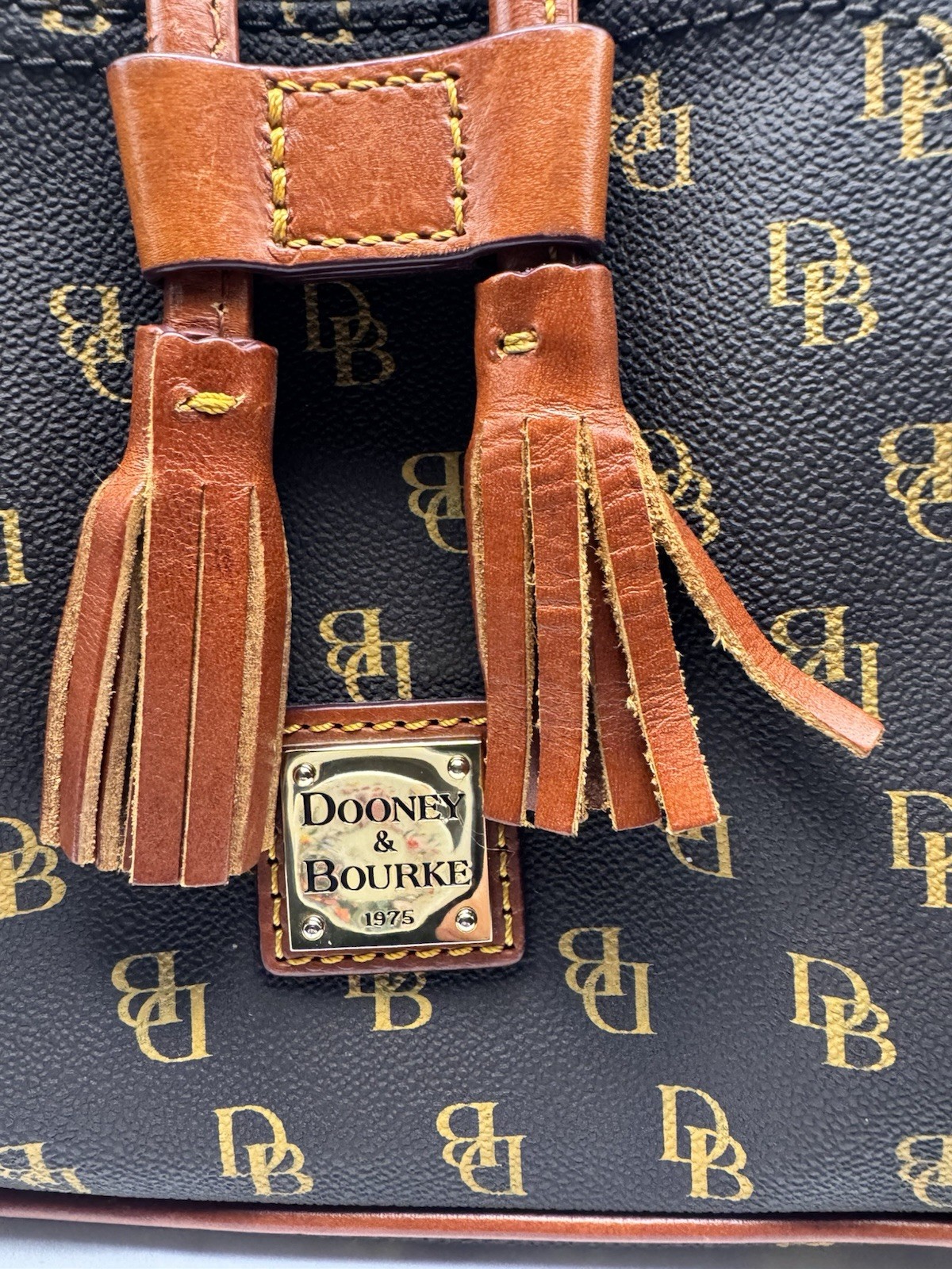 Dooney & Bourke Greta Signature Murphy Backpack Tassel Draw String Monogrammed