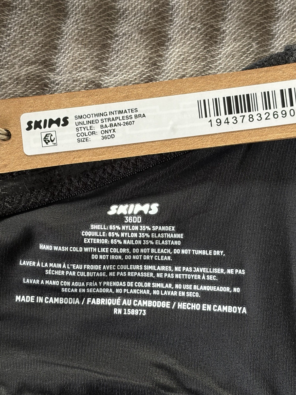 NWT~SKIMS SMOOTHING UNLINED STRAPLESS BRA~ONYX BLACK~SIZE 36DD~BA-BAN-2607
